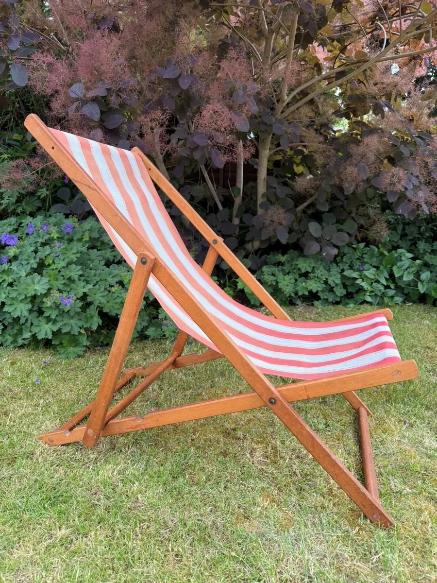 Vintage mid century 1970s wooden deck chair with red white stripe plastic seat