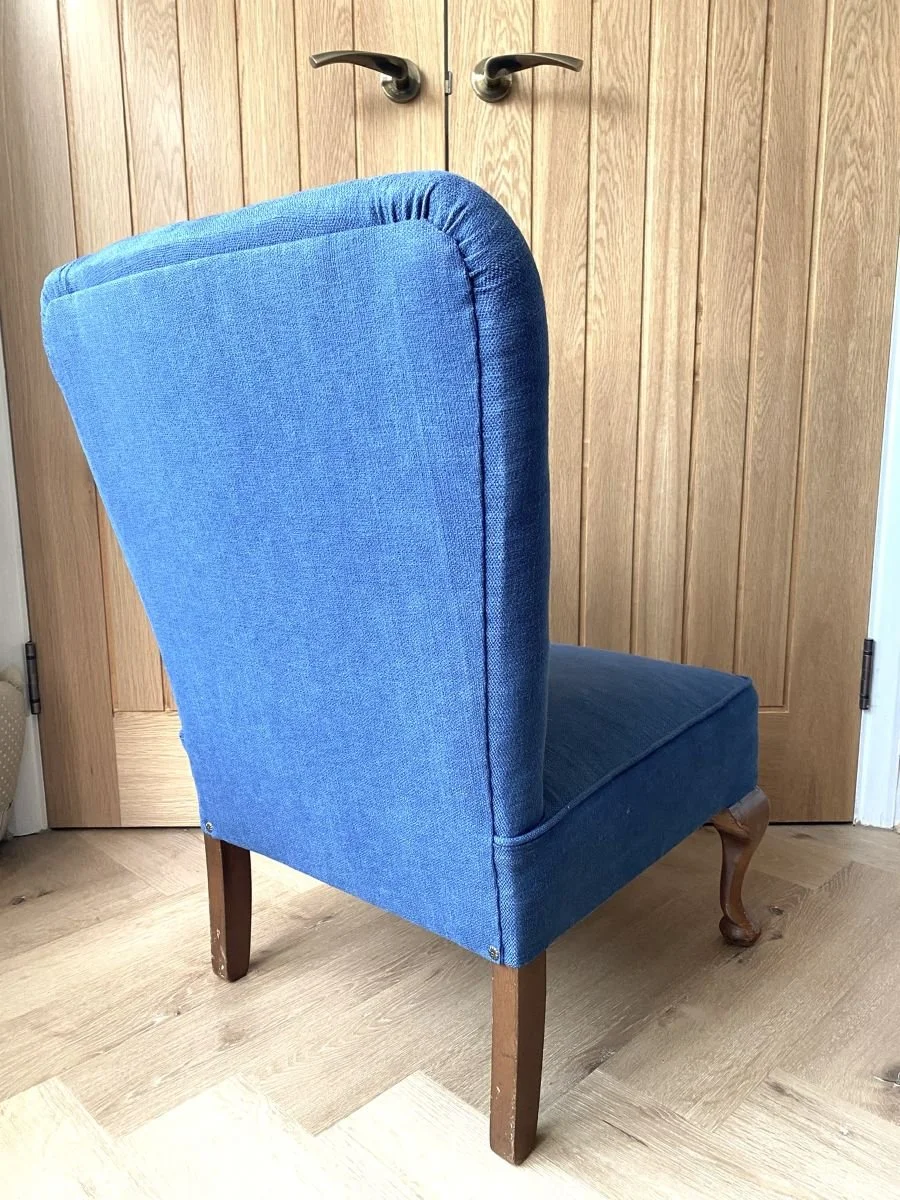 Antique reupholstered Edwardian button back nursing chair in blue