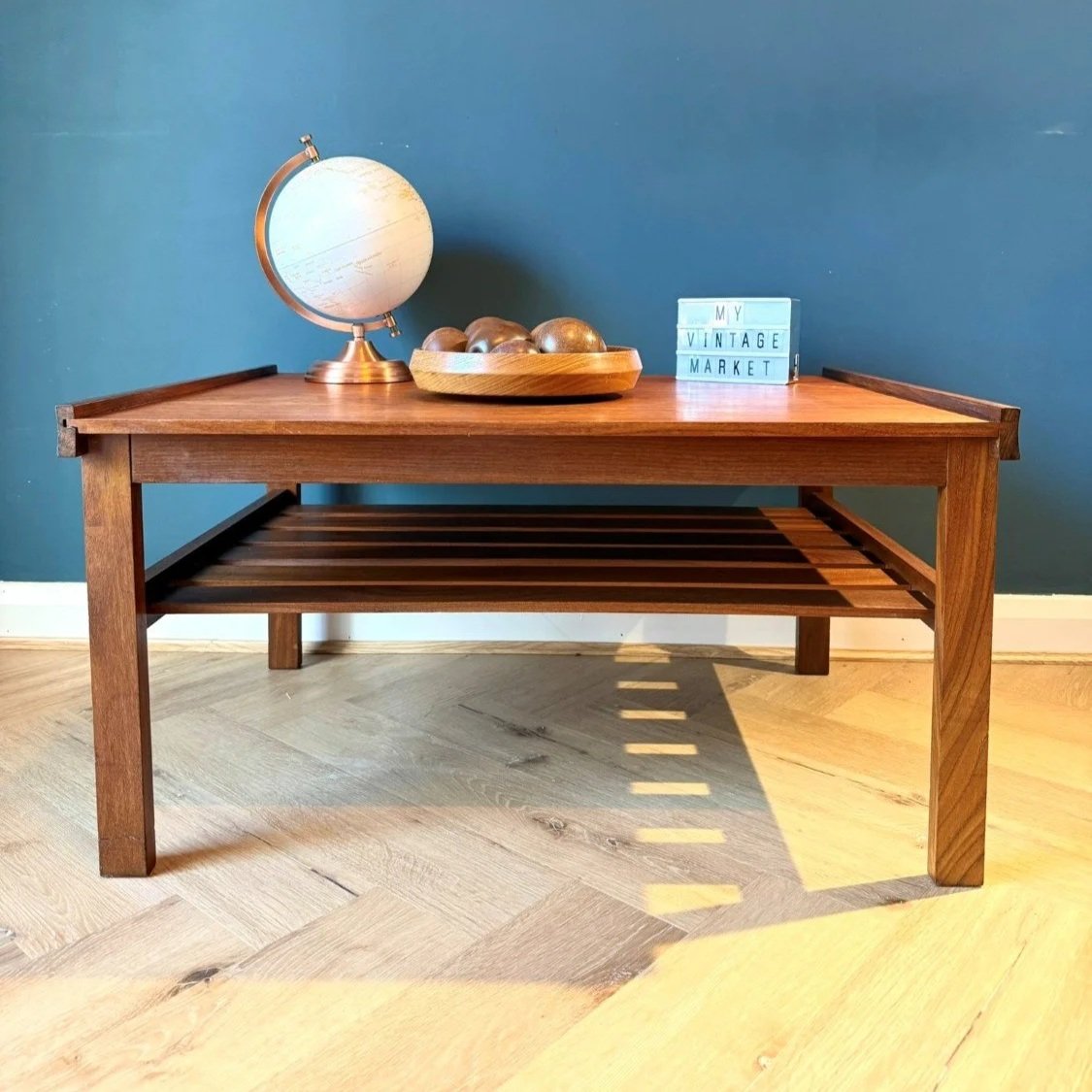 Vintage mid century 1960s two tier teak coffee table with slatted magazine rack