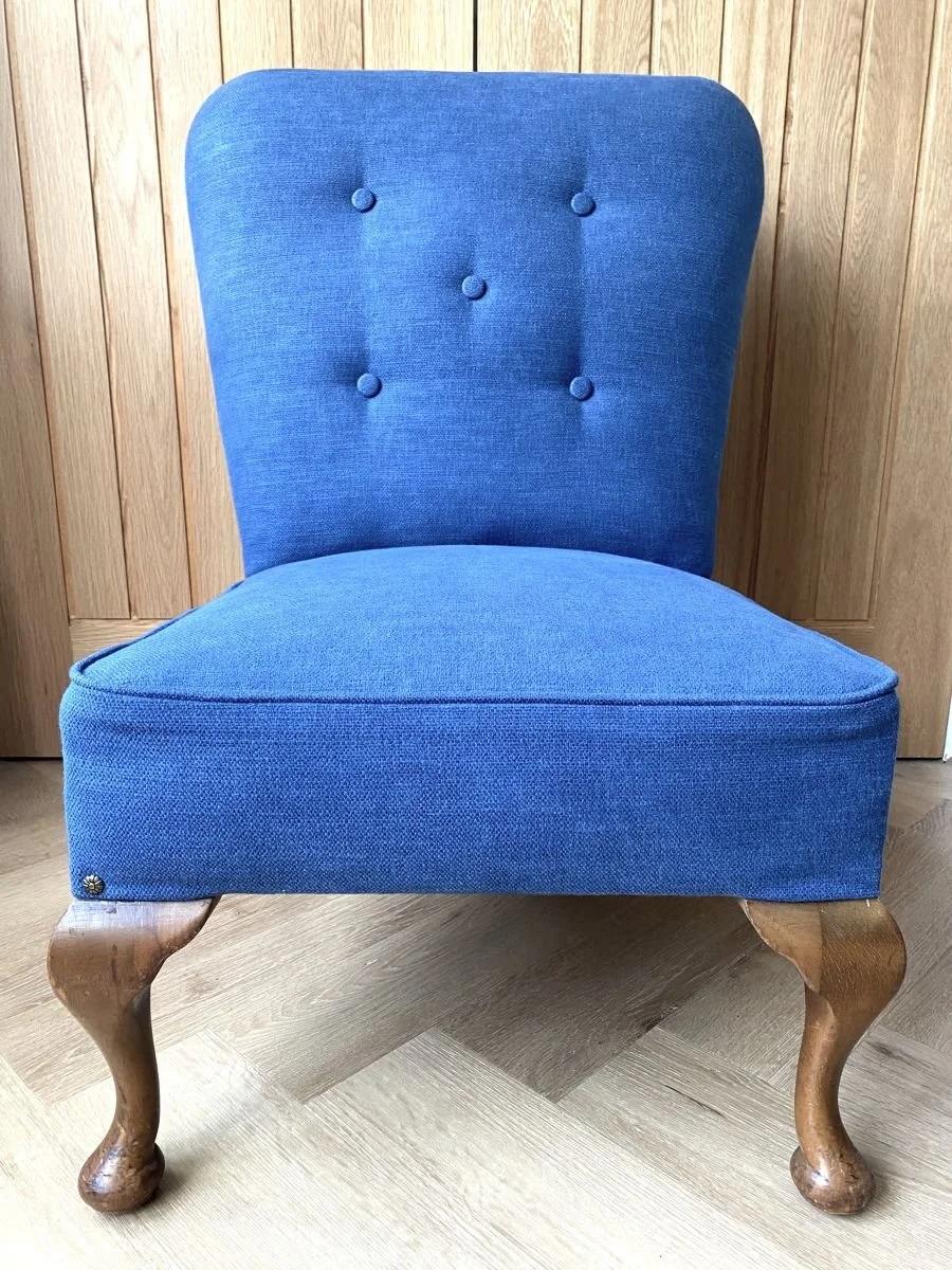Antique reupholstered Edwardian button back nursing chair in blue