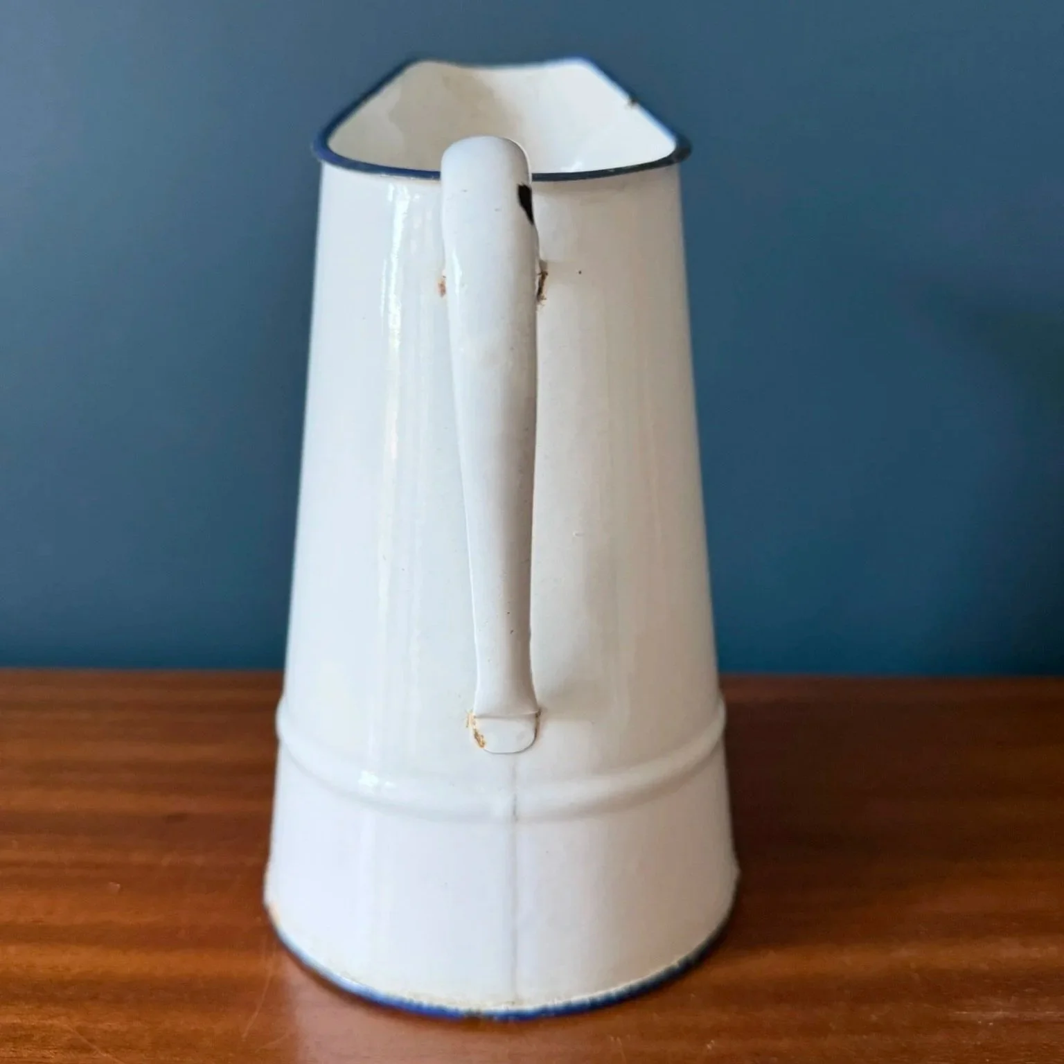 Vintage French white enamelled pitcher jug with blue rim rustic mid century