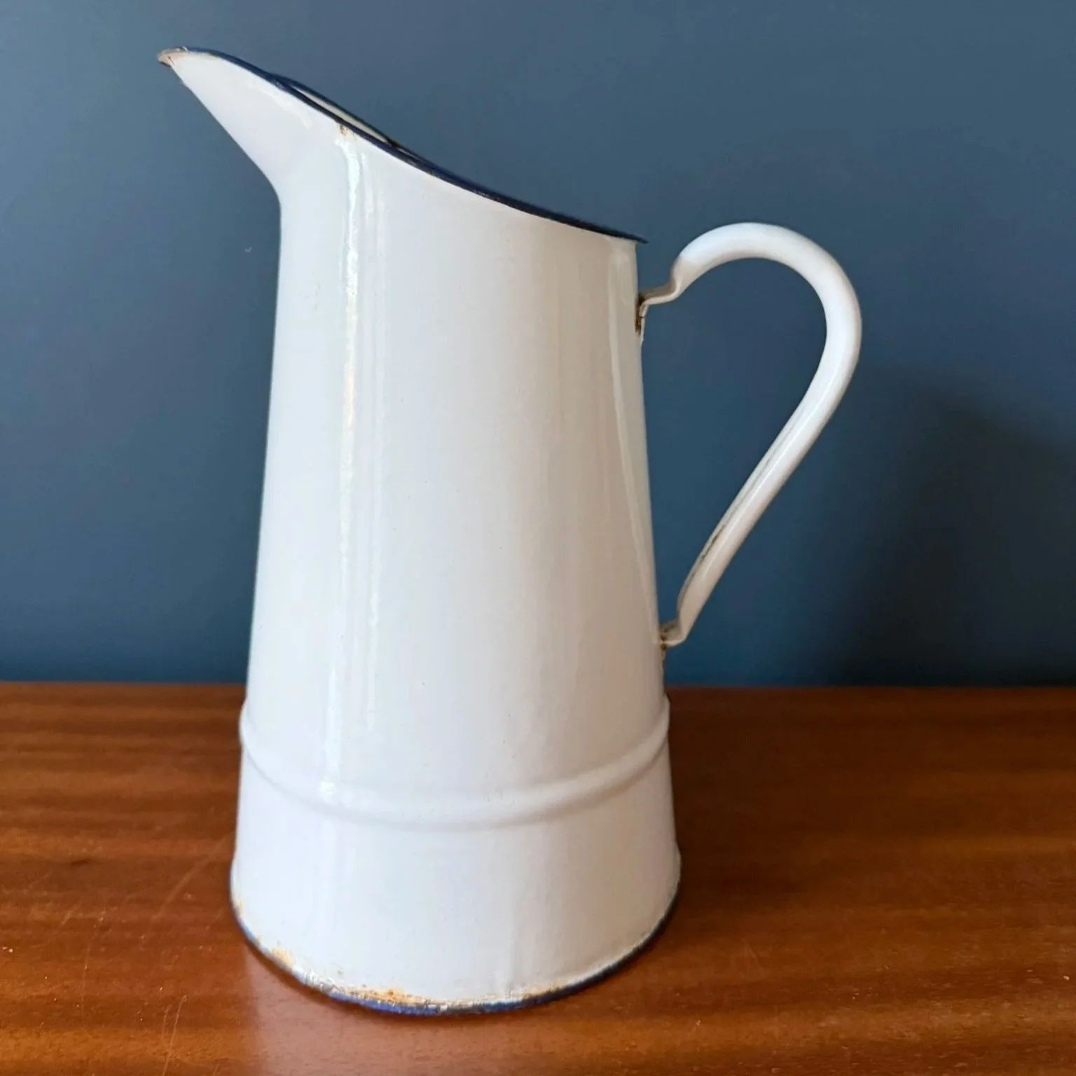 Vintage French white enamelled pitcher jug with blue rim rustic mid century