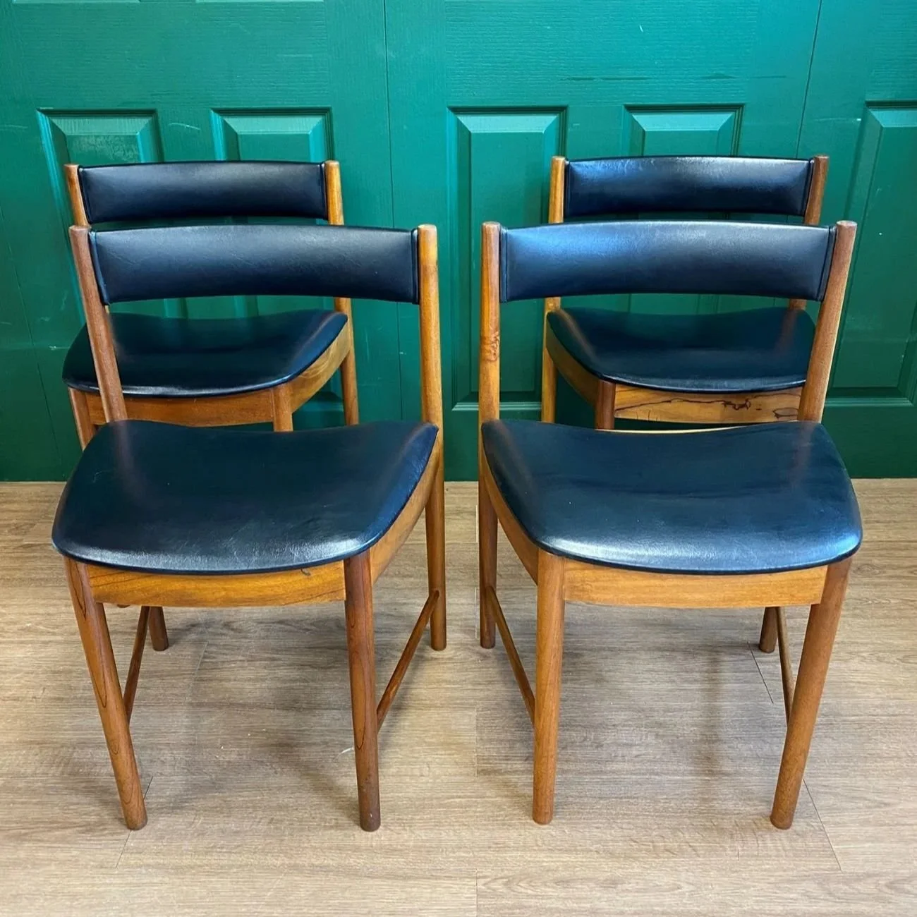 Restored Iconic 1960s McIntosh Circular Teak Extending Dining Table And Four Tuck Under Black Vinyl chairs