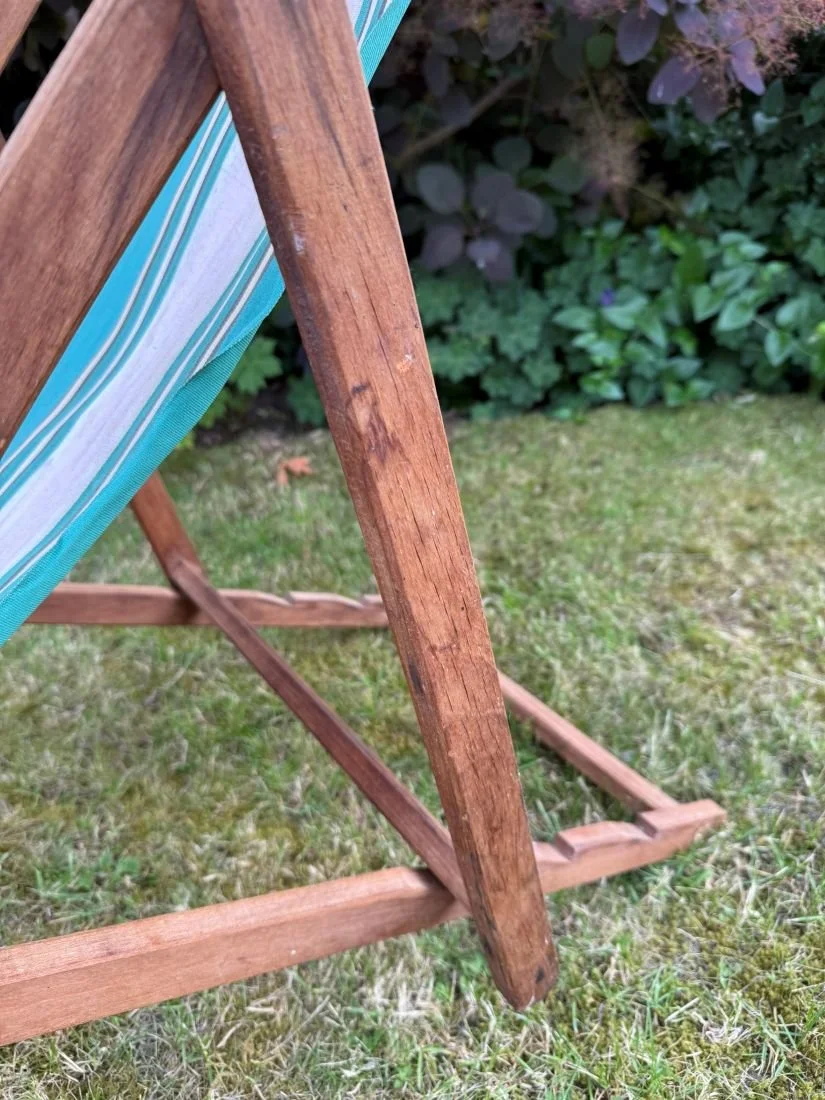Vintage mid century 1960s wooden deck chair with green white stripe fabric