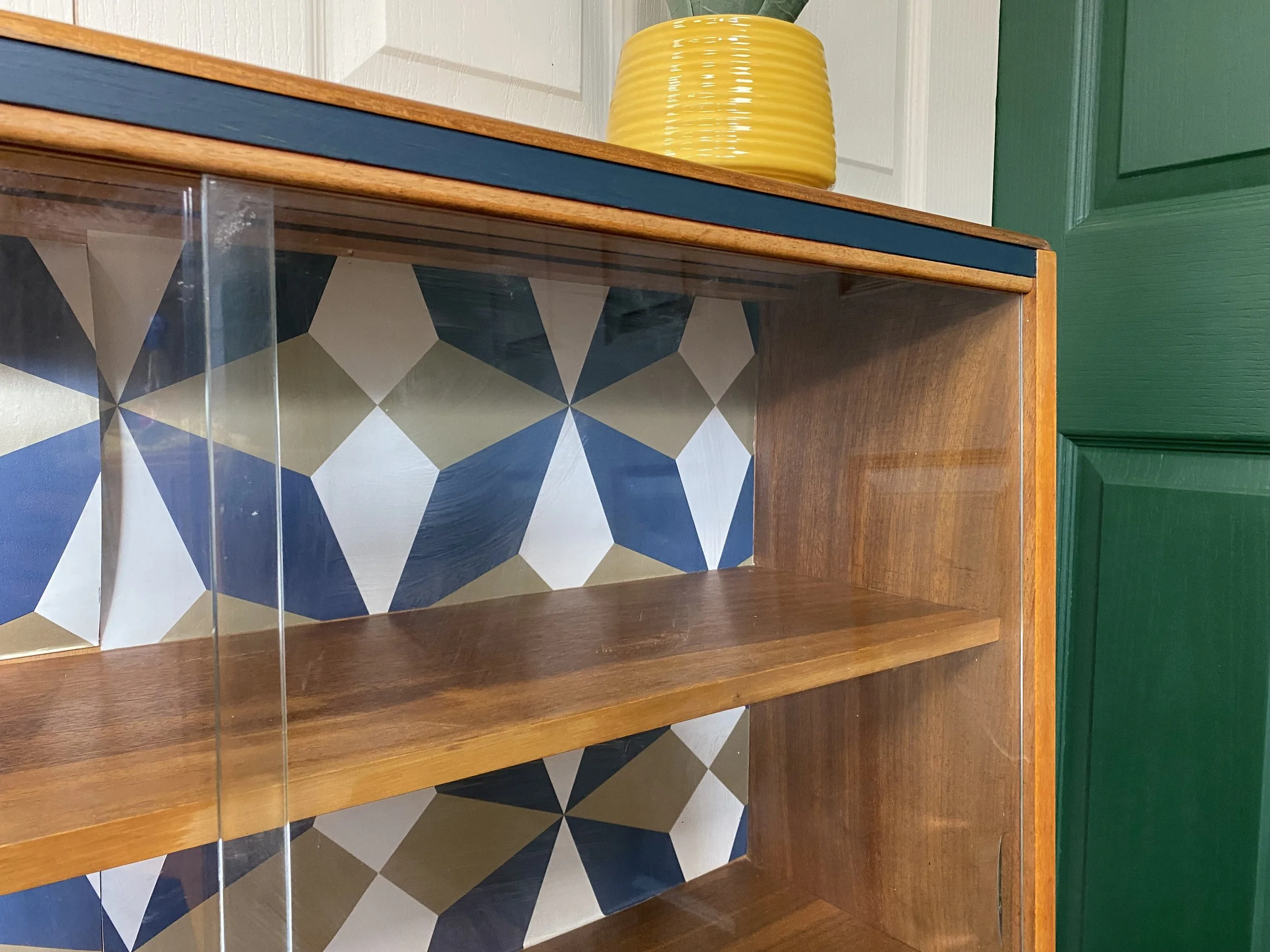 Refurbished mid century slanting teak glazed sliding door bookcase by Avalon Yatton