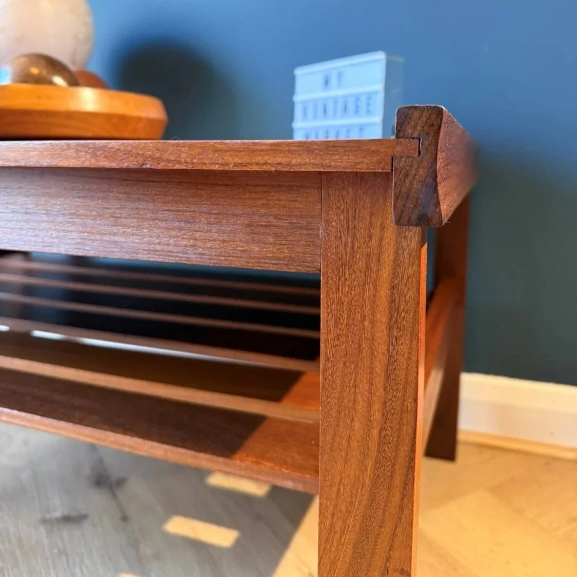 Vintage mid century 1960s two tier teak coffee table with slatted magazine rack