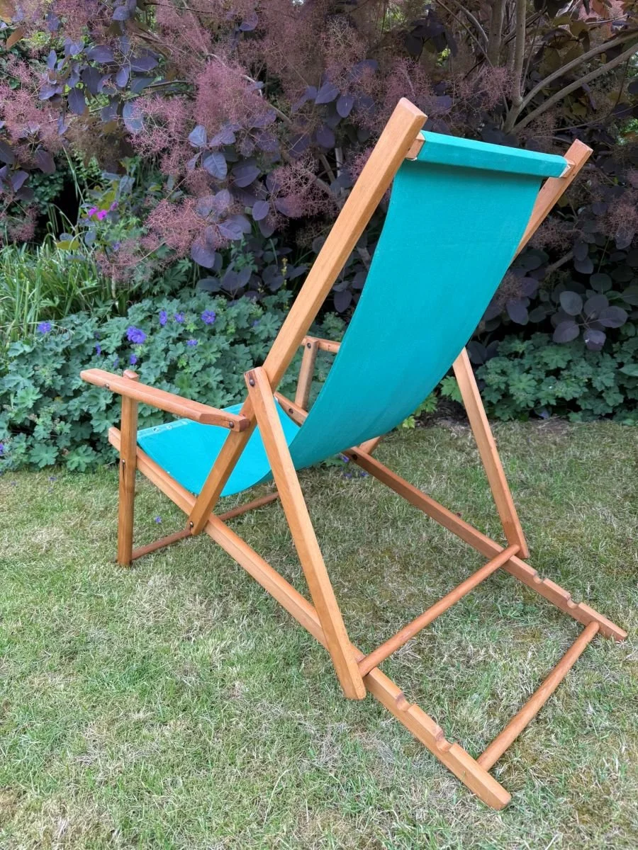 Vintage mid century 1970s wooden deck chair with green fabric