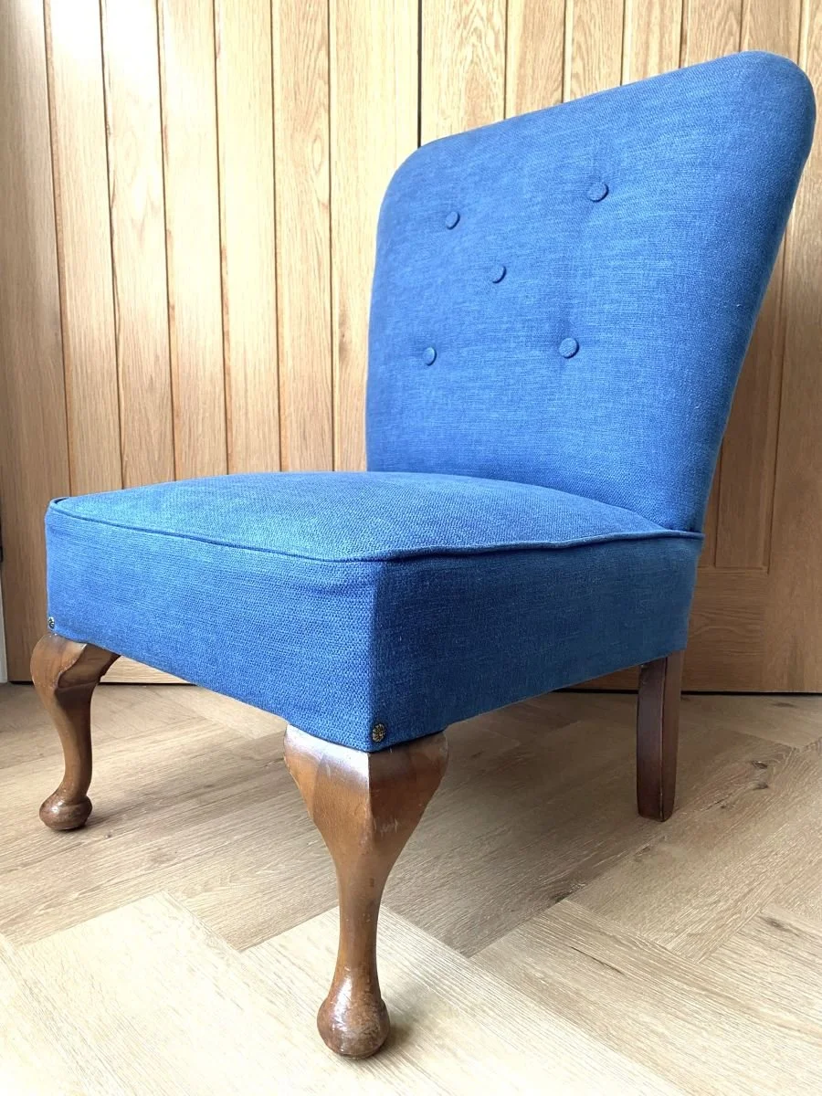 Antique reupholstered Edwardian button back nursing chair in blue