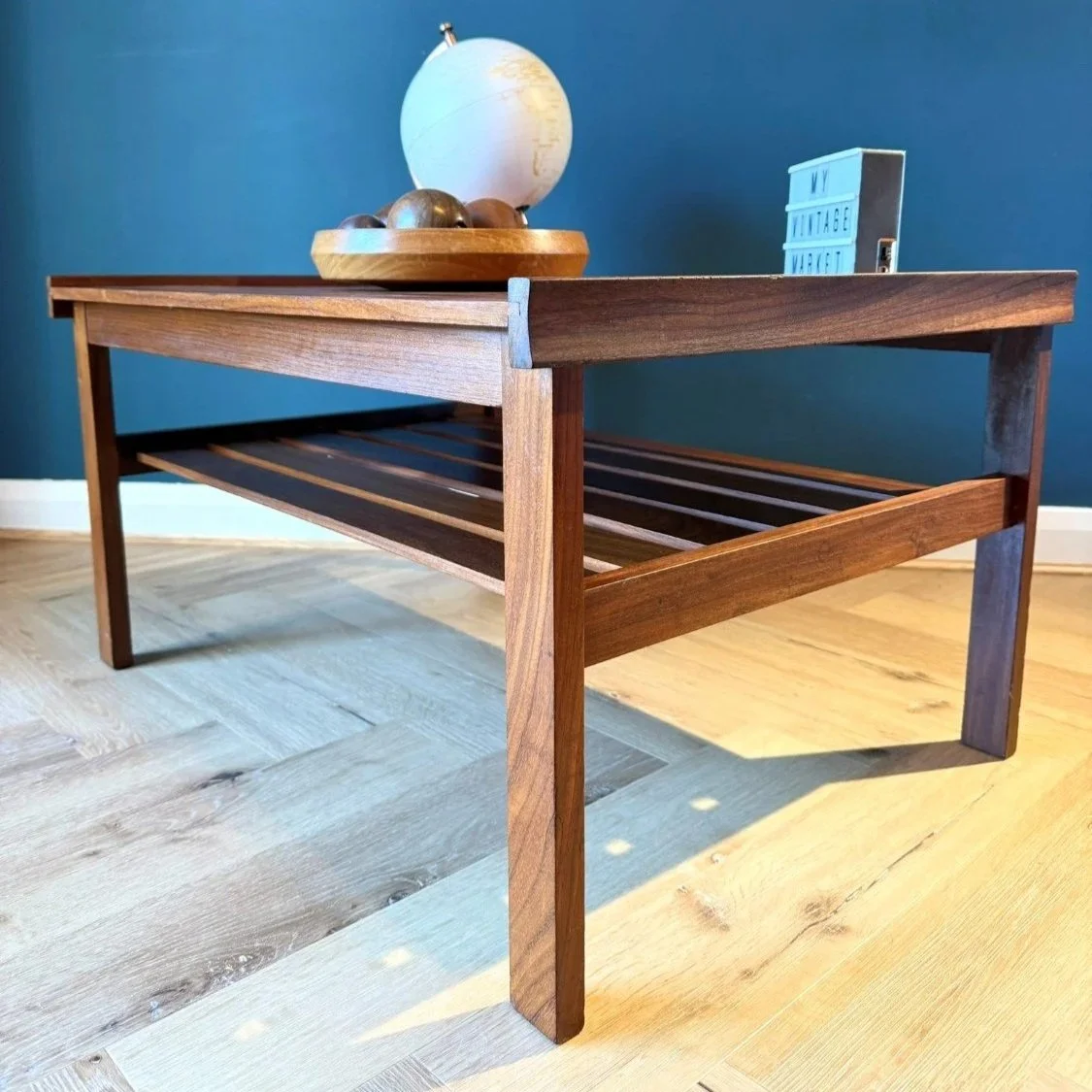 Vintage mid century 1960s two tier teak coffee table with slatted magazine rack