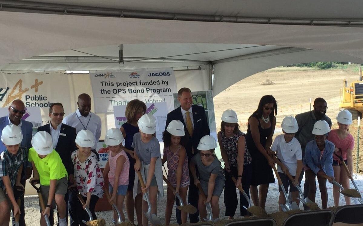 Students from Saddlebrook Elementary broke ground on a new school at 156th and Ida. The school opened in the fall of 2009. Through a joint-use arrangement with the YMCA, the school represents trend for future OPS schools that share space with the co…