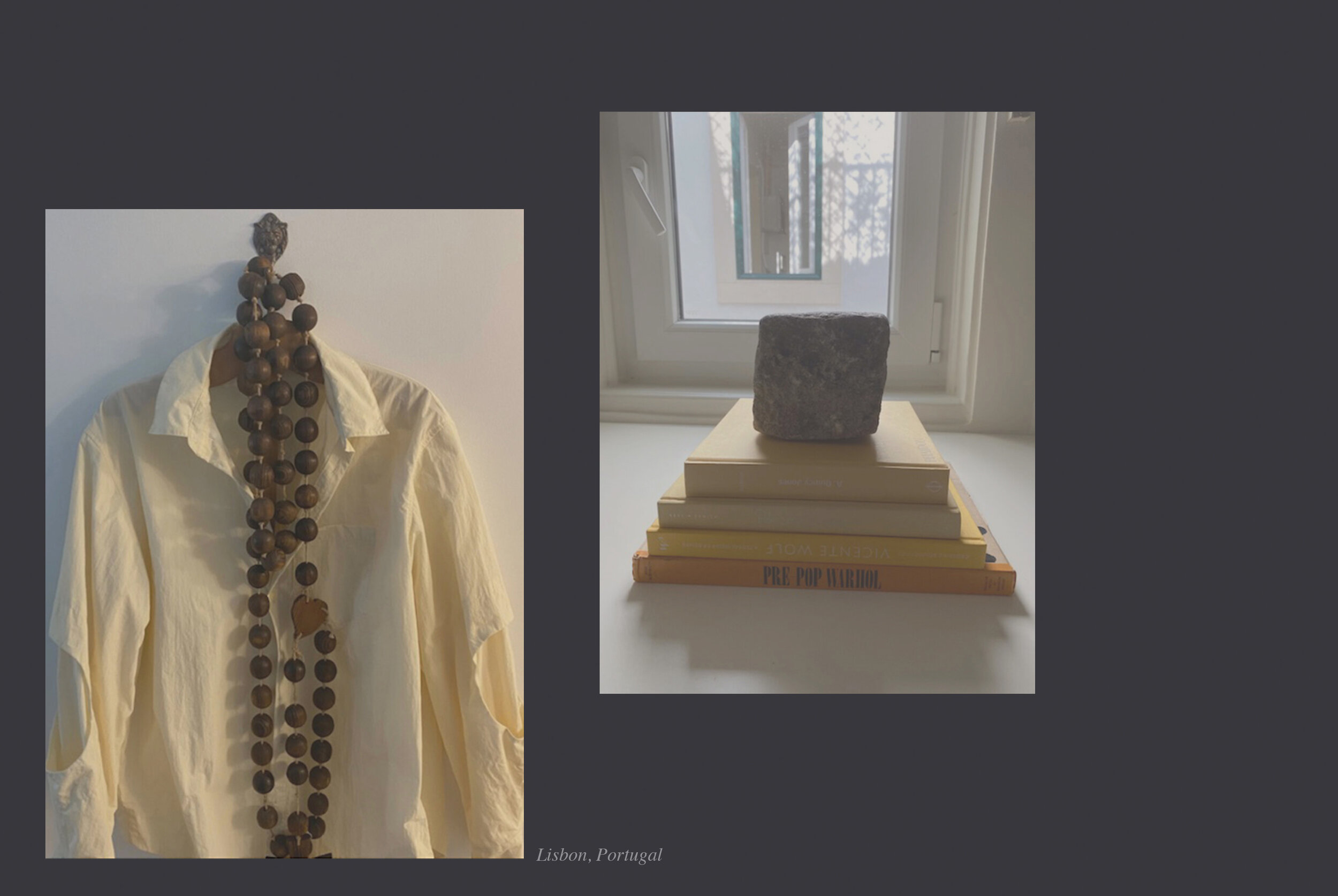 A mannequin dressed in a cream-colored shirt and a large wooden beaded necklace. Next to the mannequin is a stack of books, with a dark stone placed on top of them. The books are placed on a white surface near a window, and the view outside shows a t