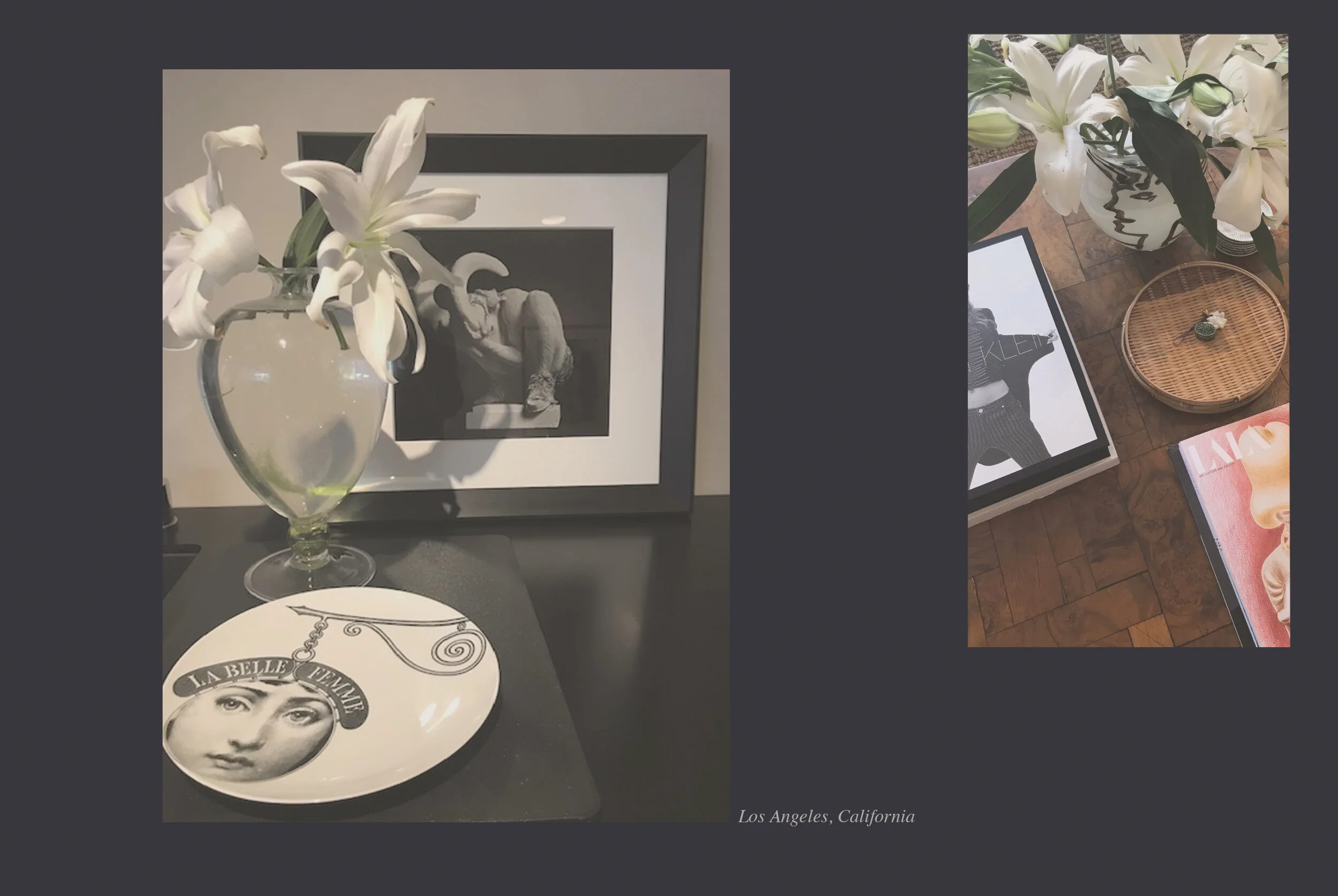 A table with a decorative plate featuring a woman's face and the words 'LA BELLE FEMME,' a bouquet of white lilies in a glass vase, a framed artwork in the background, a wicker tray holding small objects, and a magazine. The location is Los Angeles, 
