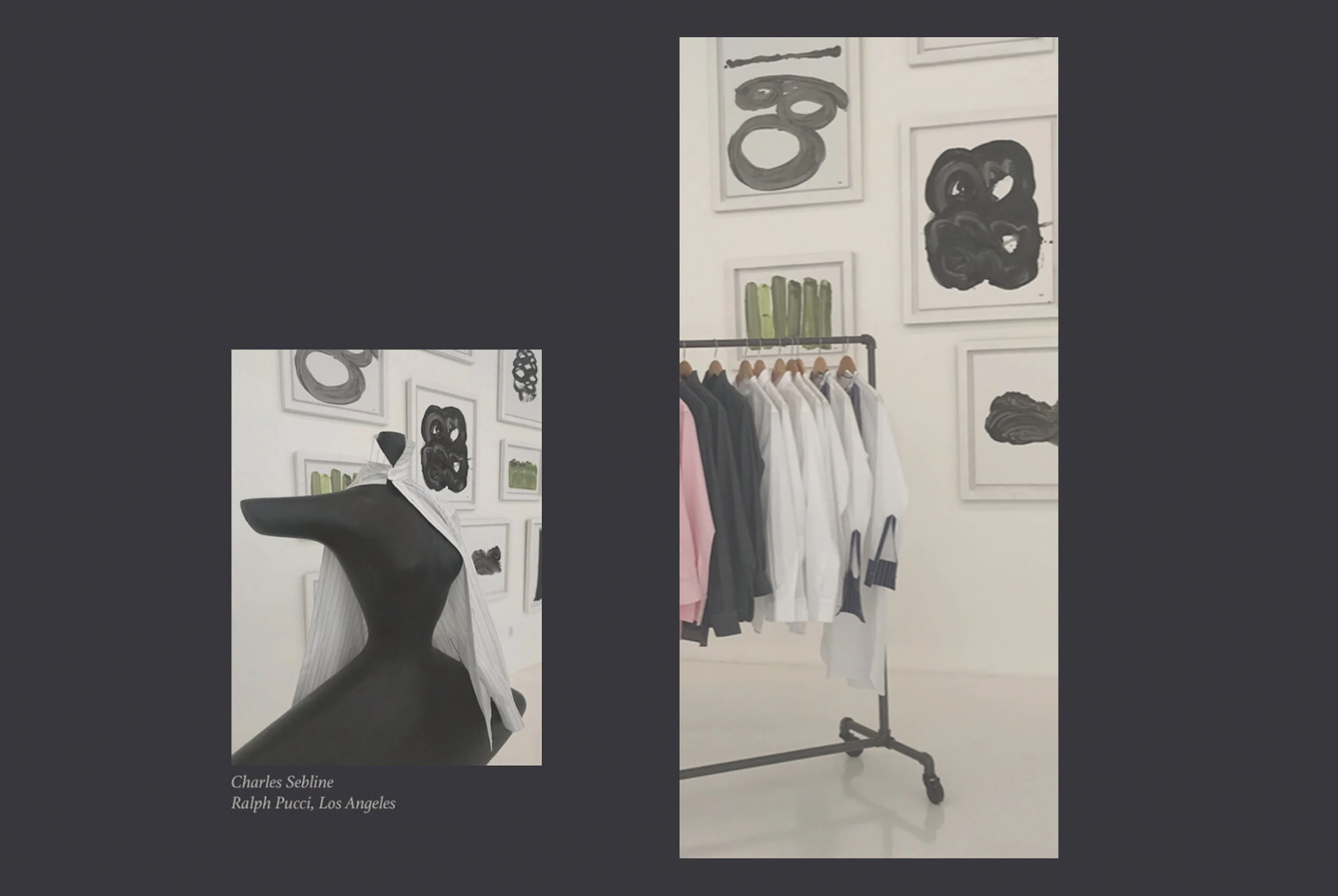 A fashion display with artwork on white walls, racks of hanging shirts, and a mannequin torso in black and white stripes.