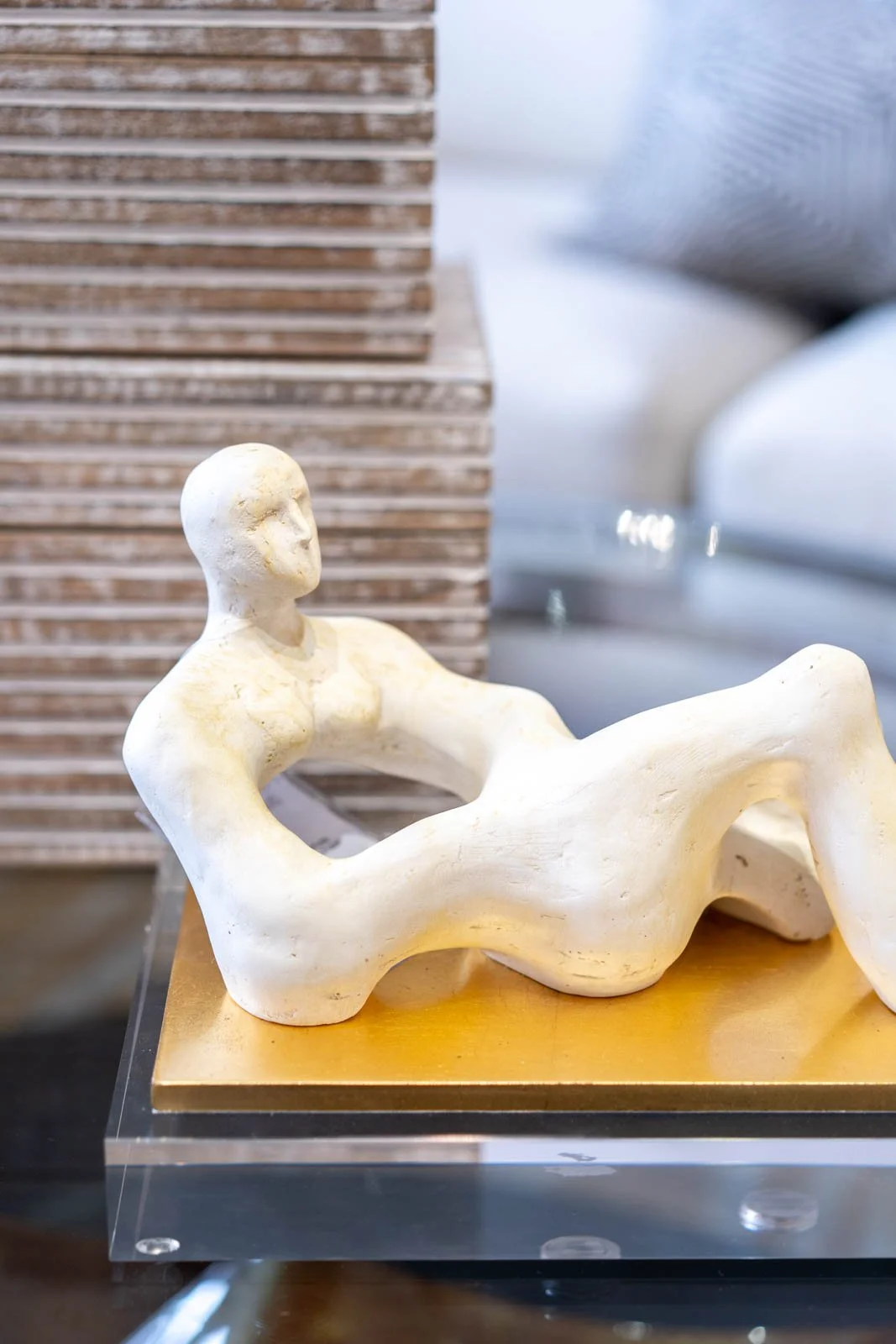 White statue on display in a showroom