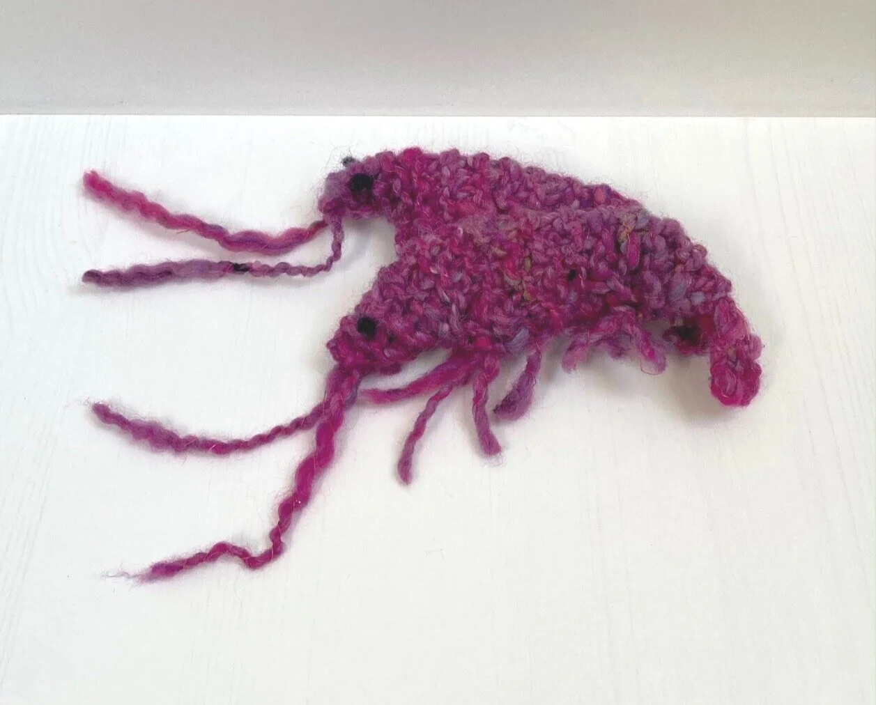 Knitted prawn catnip toy