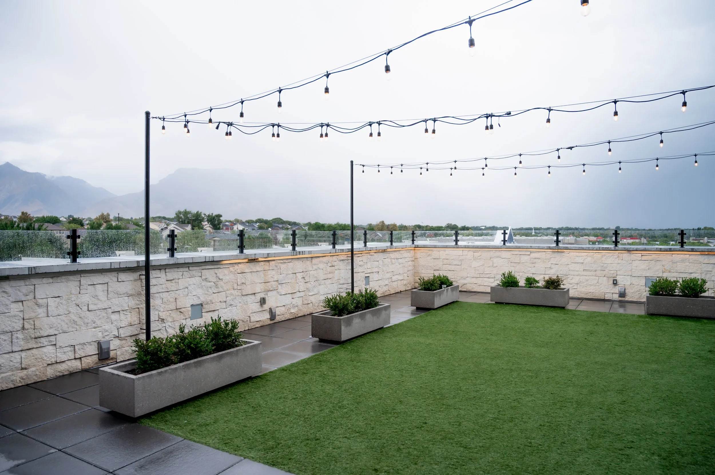 A rainy day in the courtyard with gray clouds overhead.