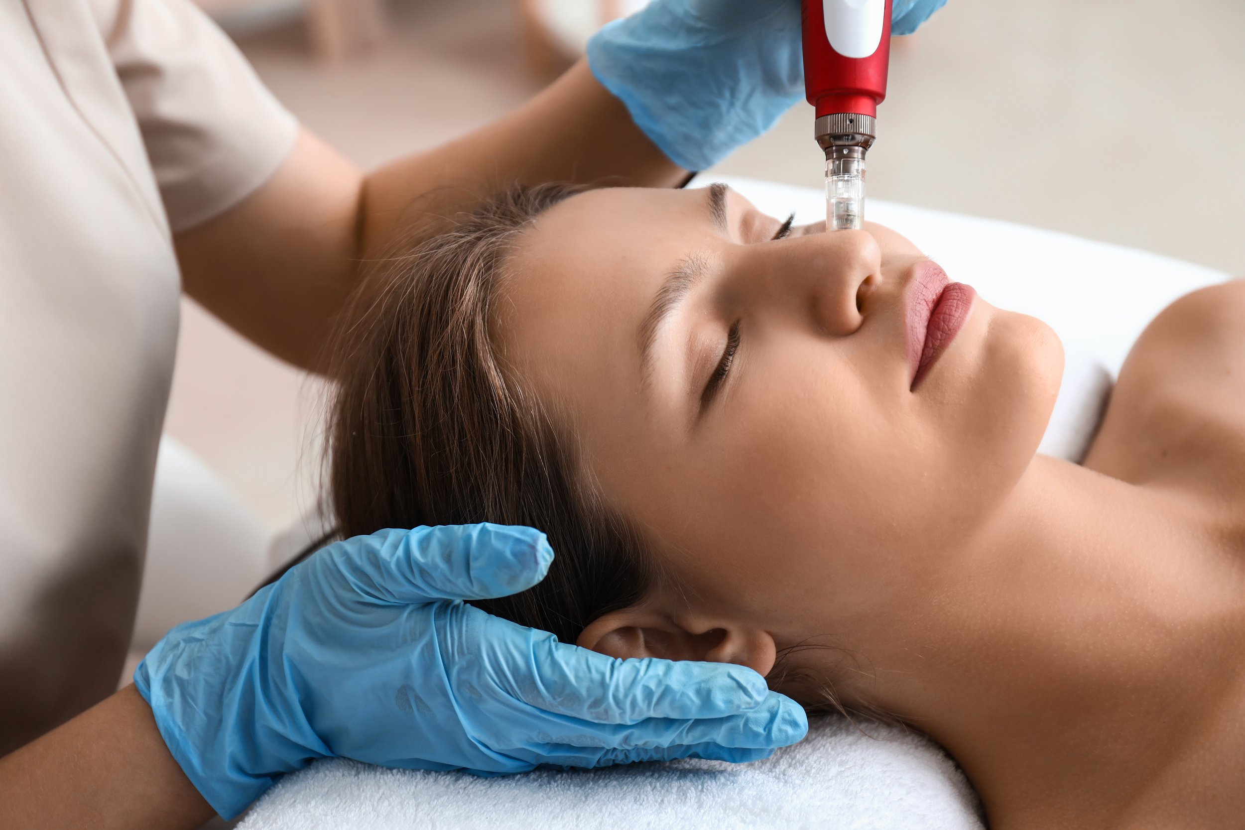young-woman-undergoing-procedure-bb-glow-treatment-beauty-salon.jpg