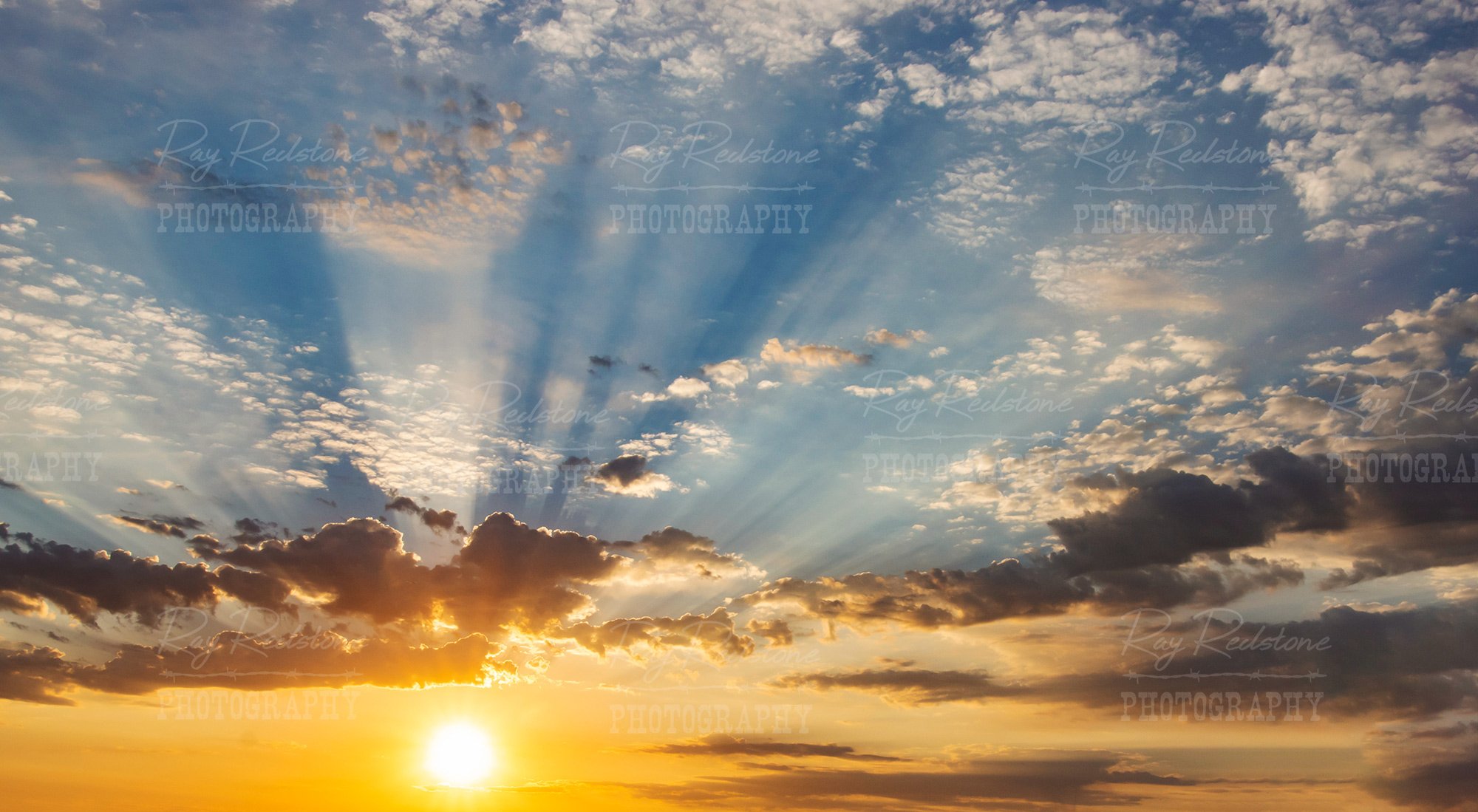 Rising Sun In The Arizona Desert With Sun Rays