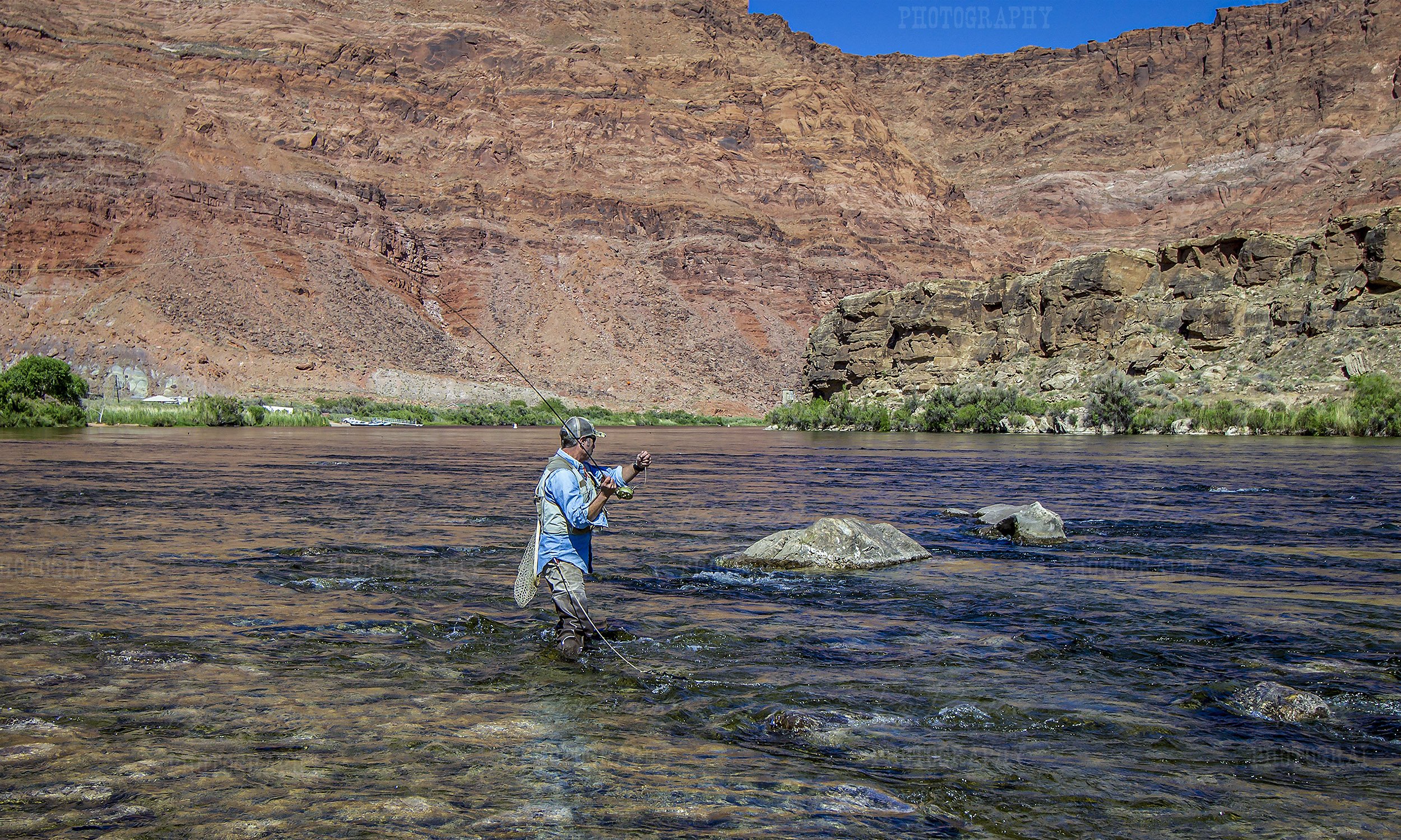 Man Fly Fishing Colorado River