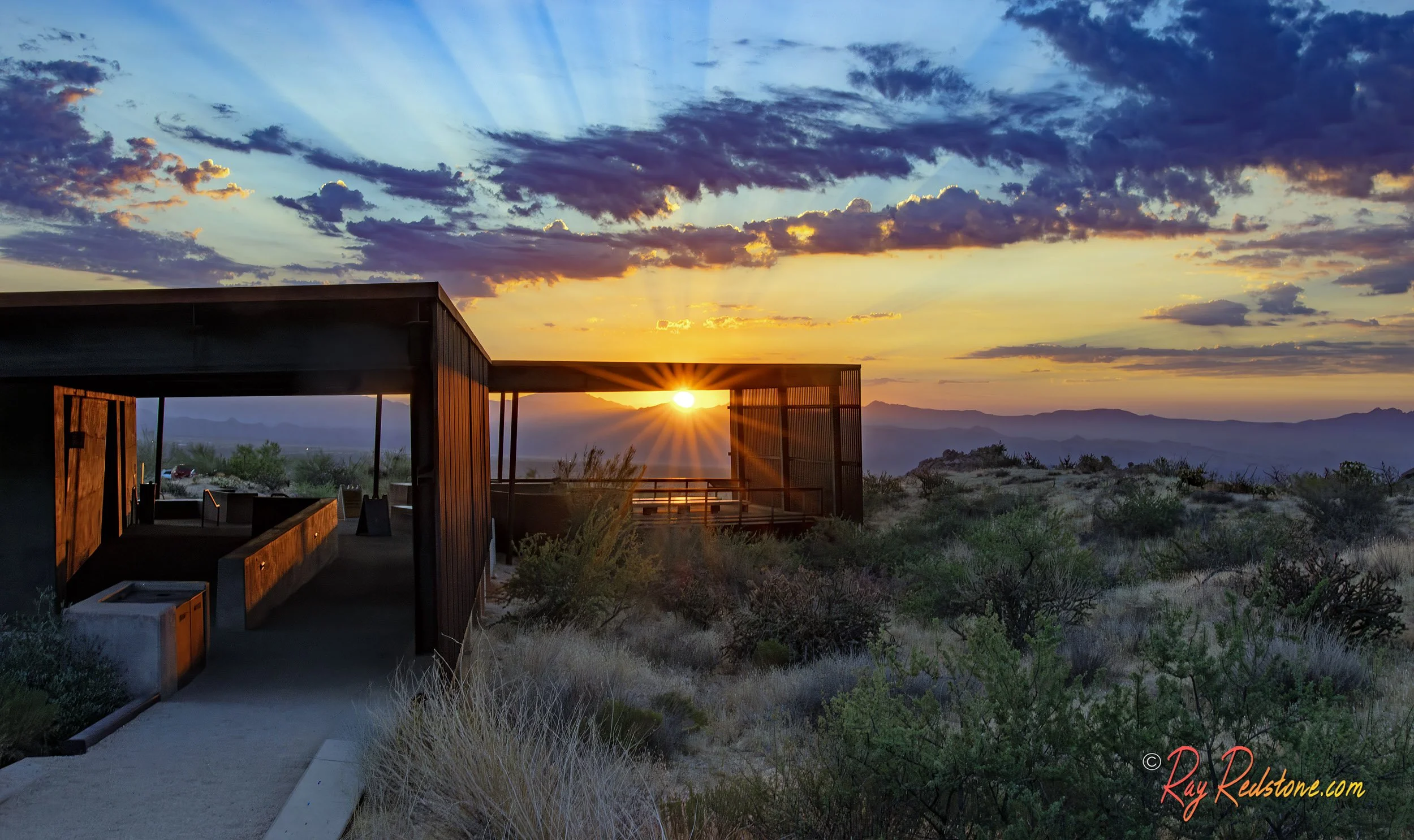 Sunrise at the Toms Thumb Trailhead building in Scottsdale AZ