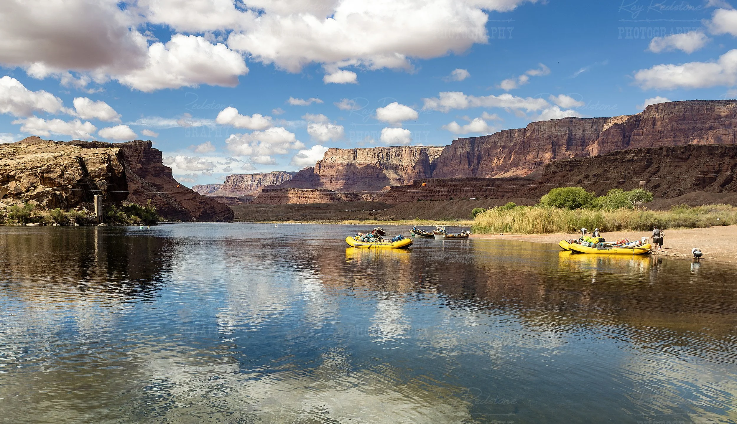 Rafting Party Heading Down Colorado River At Lees Ferry