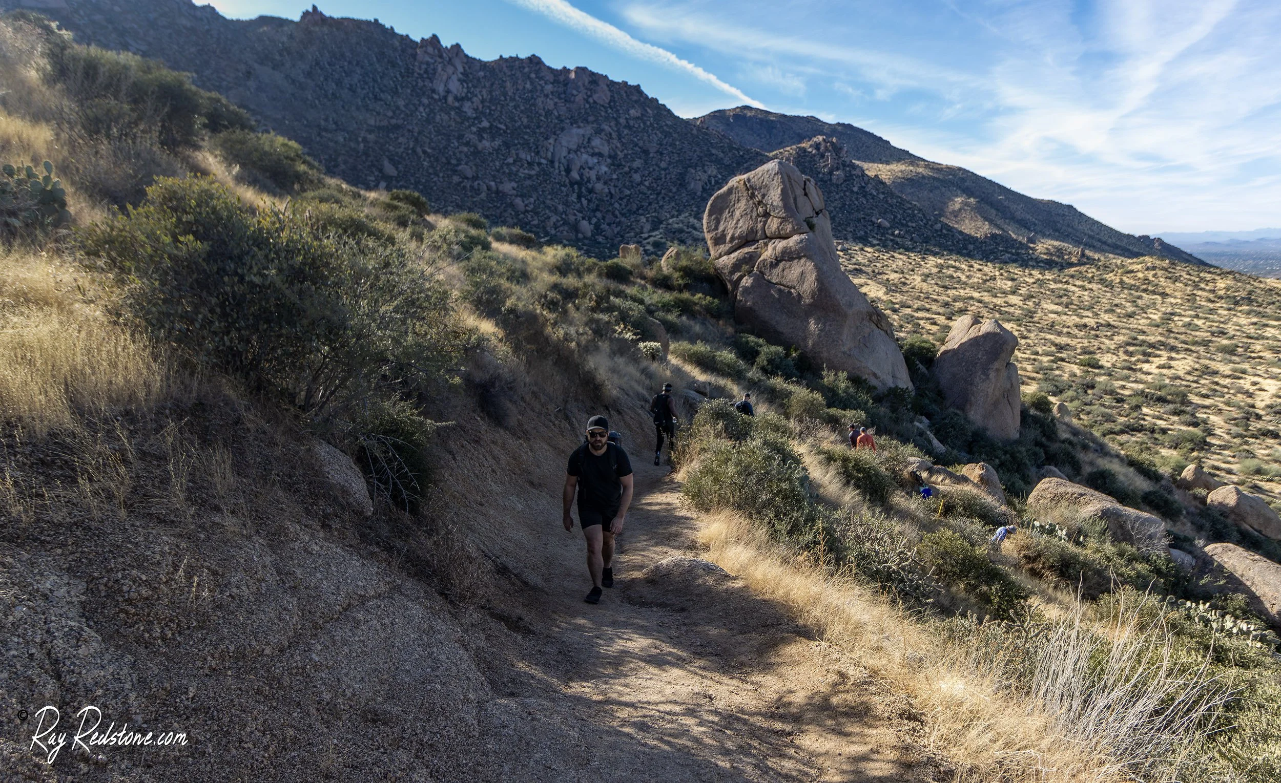 Hiker heading up Toms Thumb trail in Scottsdale