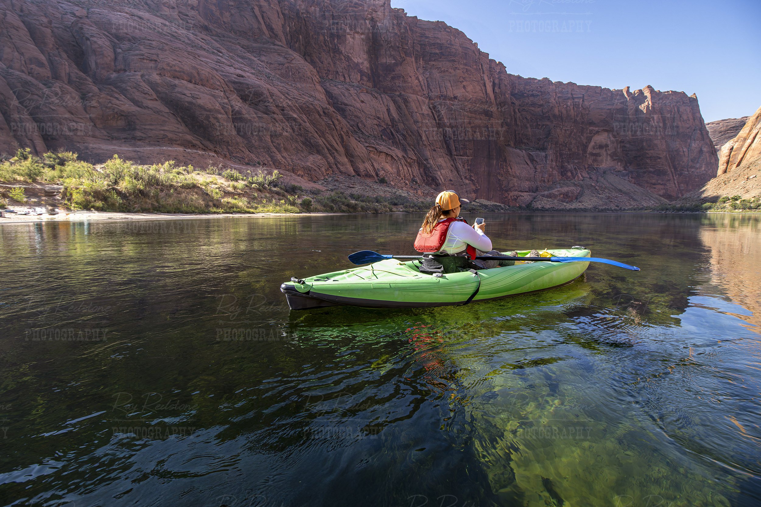 Woman In Kayak On Colorado River In Arizona