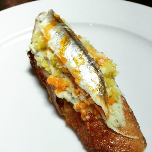 Food_crostini with anchovies on white bean & egg mimosa.jpg