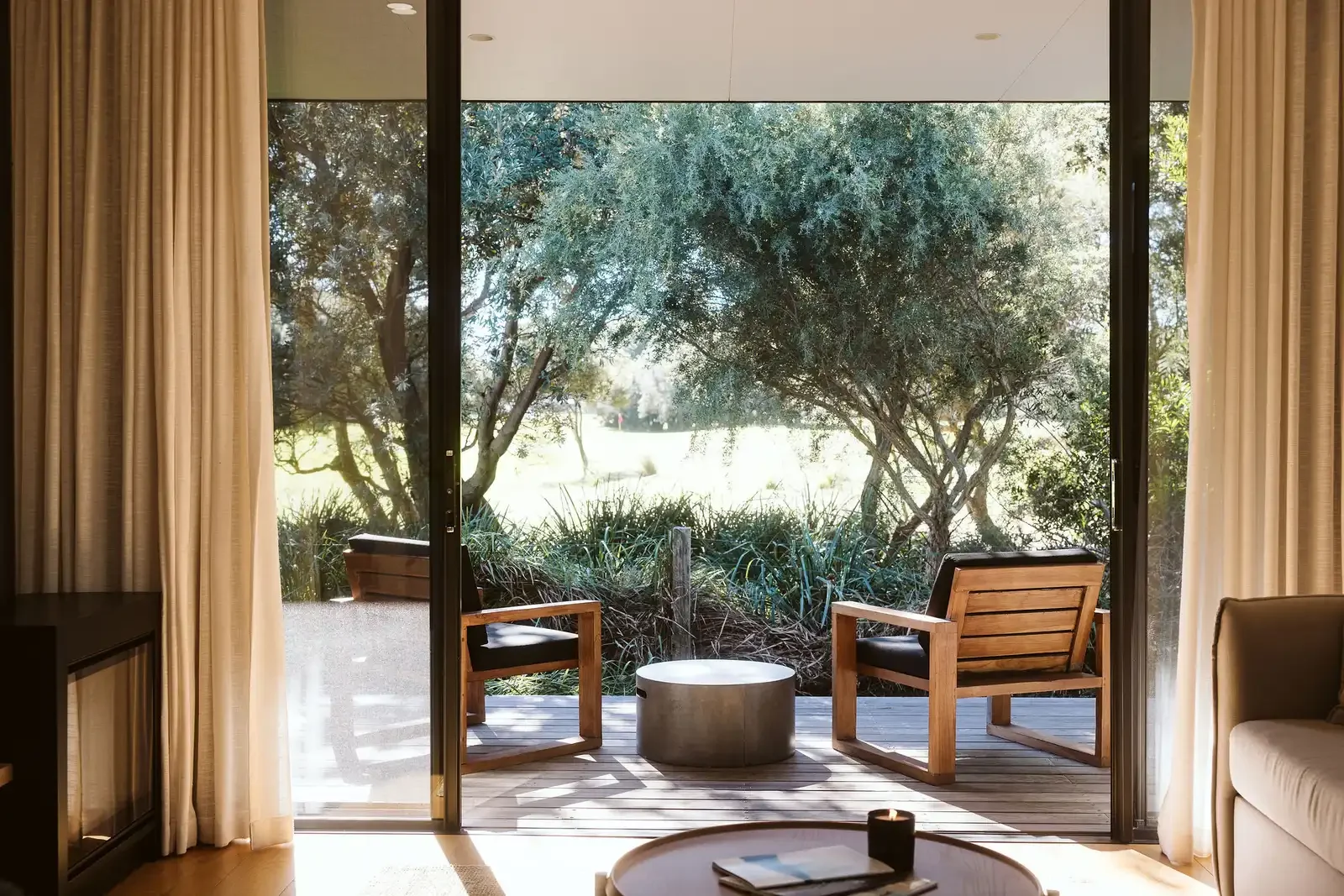bangalay-luxury-villas-dining-room-garden-doors.webp