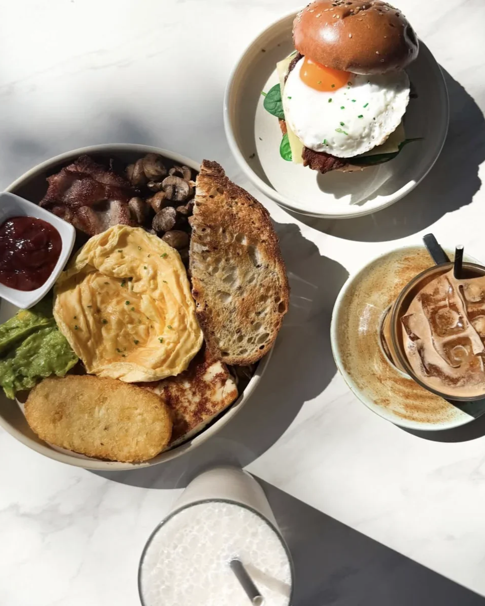 bianchinis-big-breakfast-bowl-egg-burger-iced-coffee-overhead.png