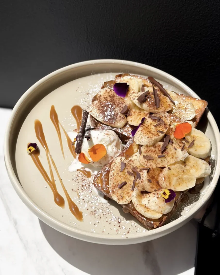 bianchinis-breakfast-french-toast-banana-caramel-edible-flowers.png
