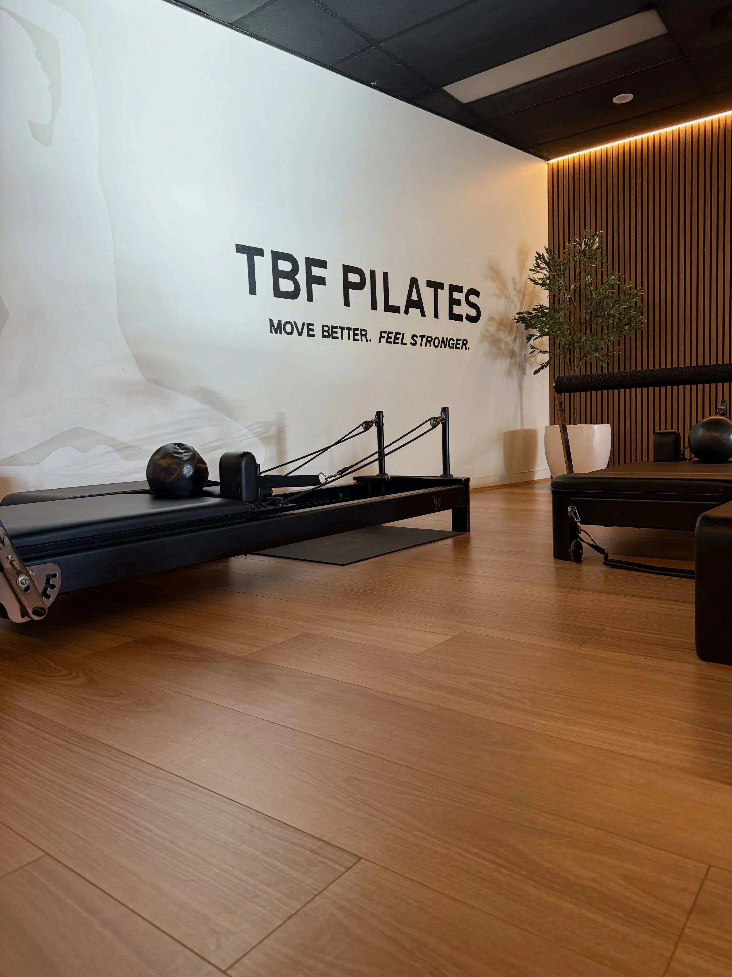 TBF pilates studio with a reformer machine