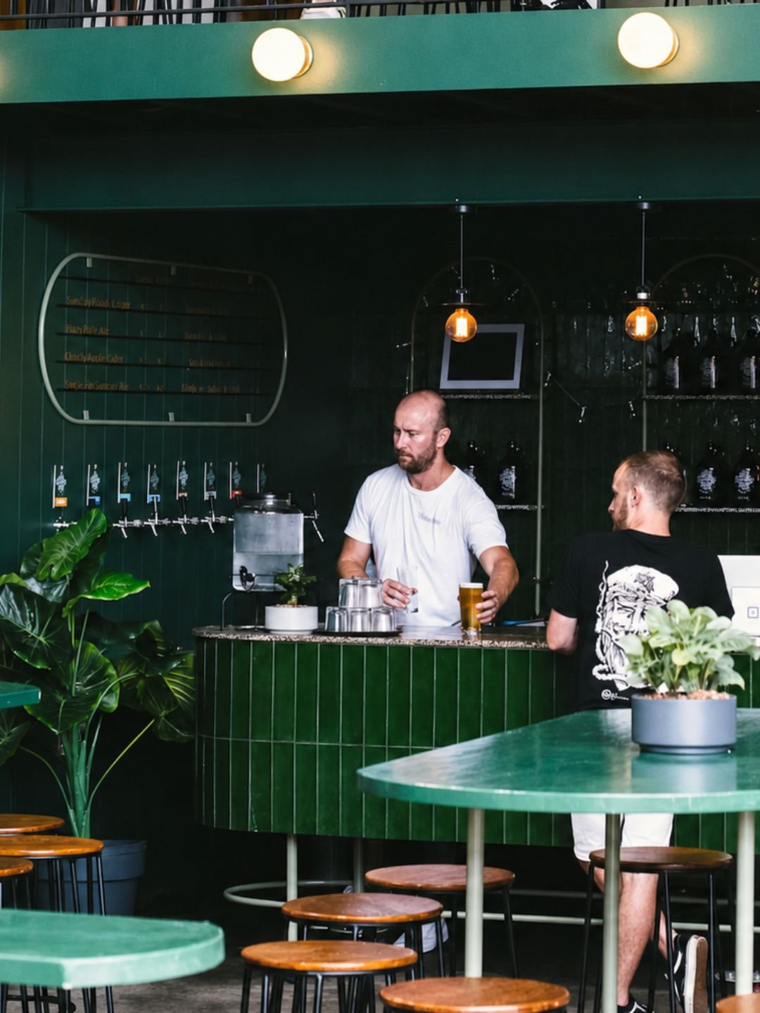 Bartender pouring a beer at Sunday Road Brewery, Kirrawee