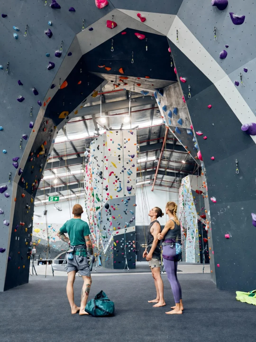 Climbers chatting beneath the bouldering walls at Climb Fit, Kirrawee