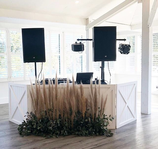Our DJ Facade styled with amazing pampas! Very popular choice to make your entertainment set up as perfect as your wedding!