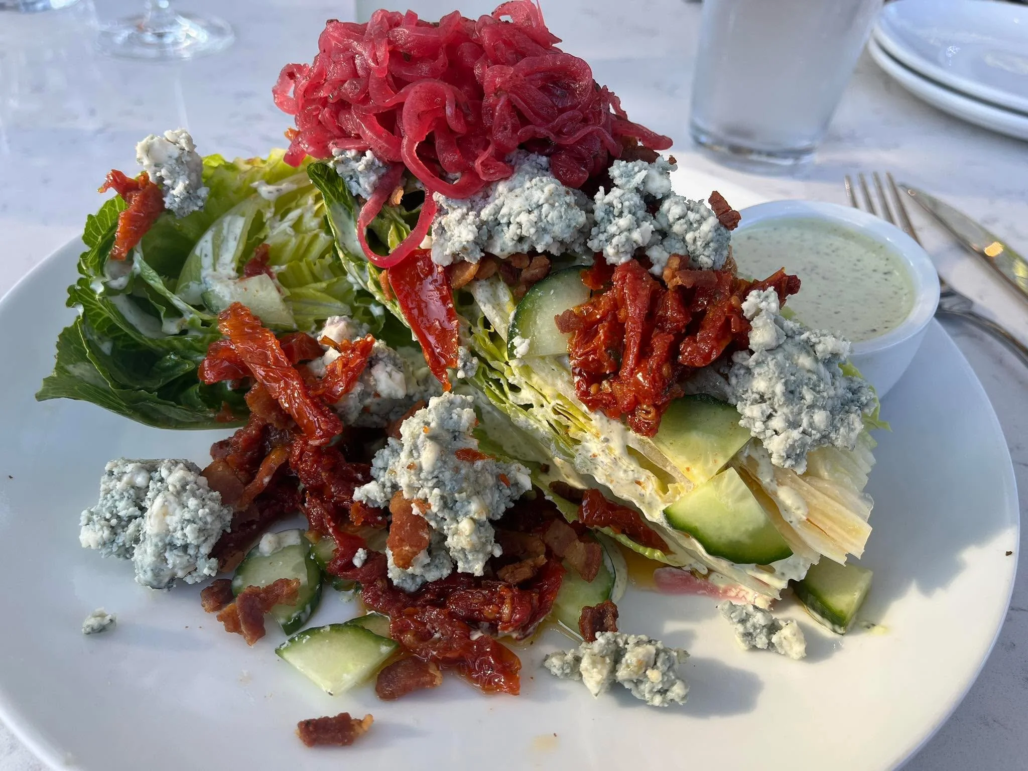 At On The Waterfront Restaurant enjoying their Wedge Salad.