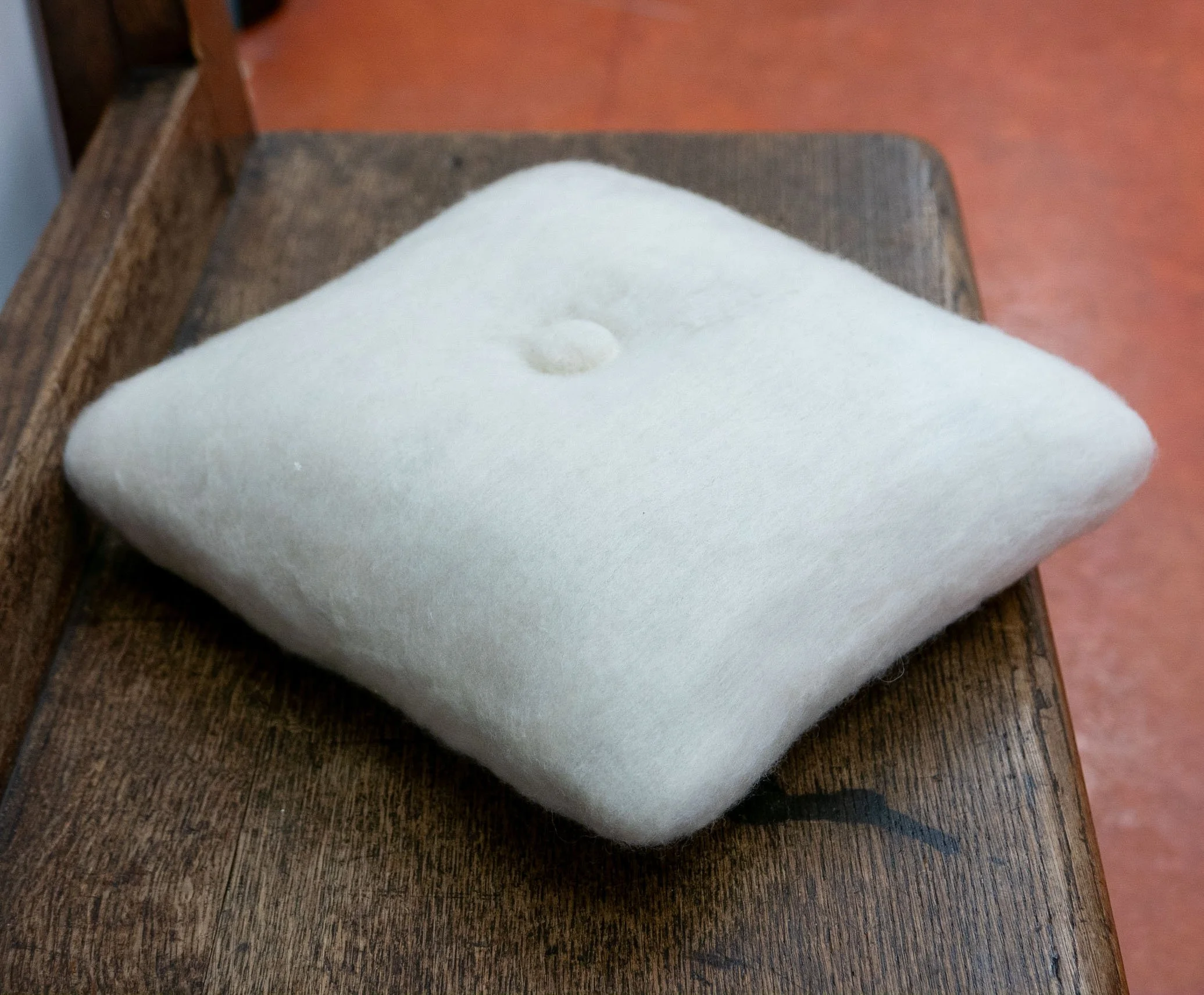 'The Pillow' - wool fibers, fabric stiffener - 30x30x45 cm - 2019