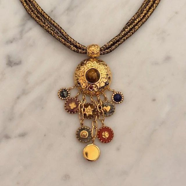 collana ciondolo e charms