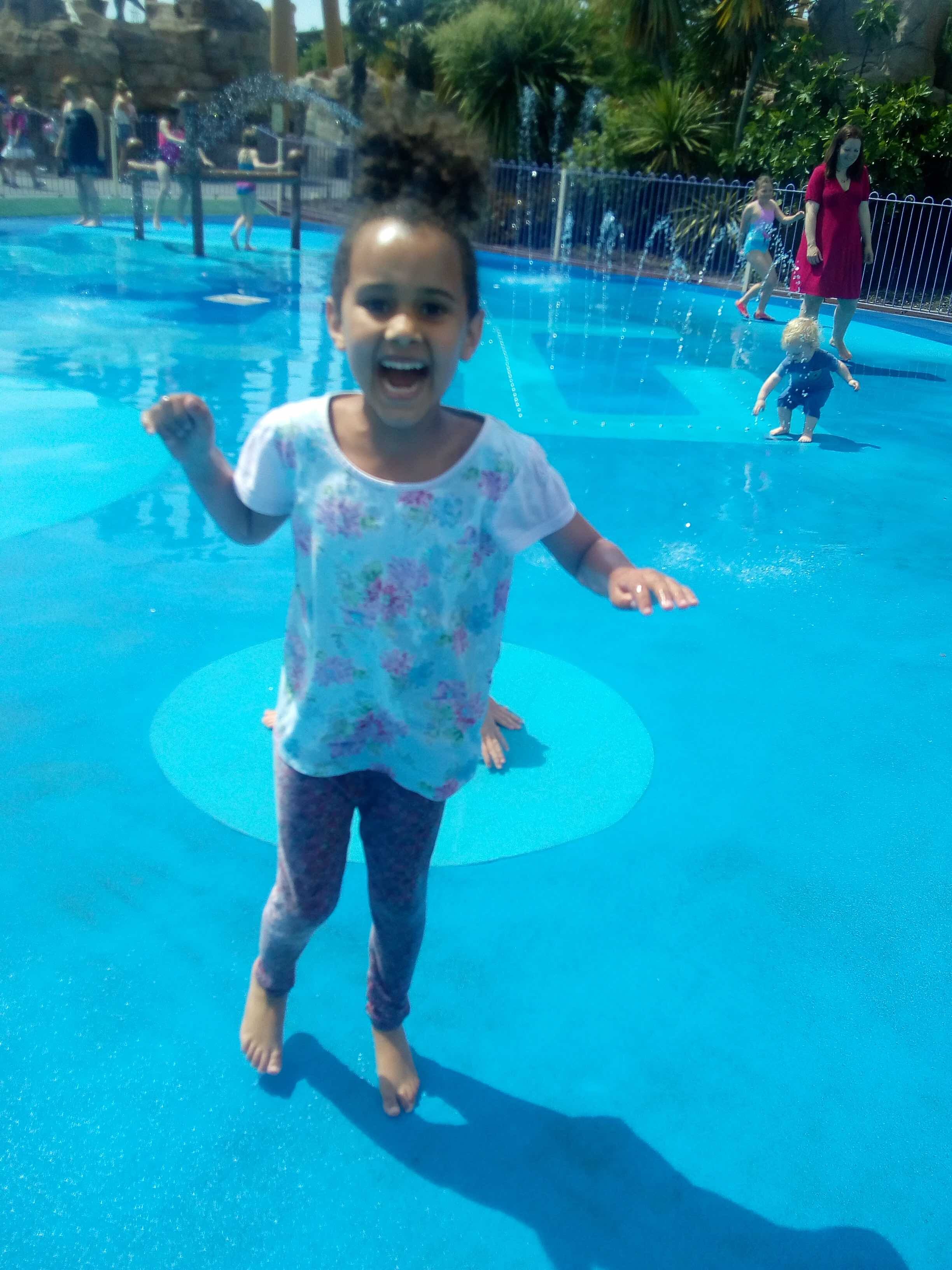 girl with blue background in pool72.jpg