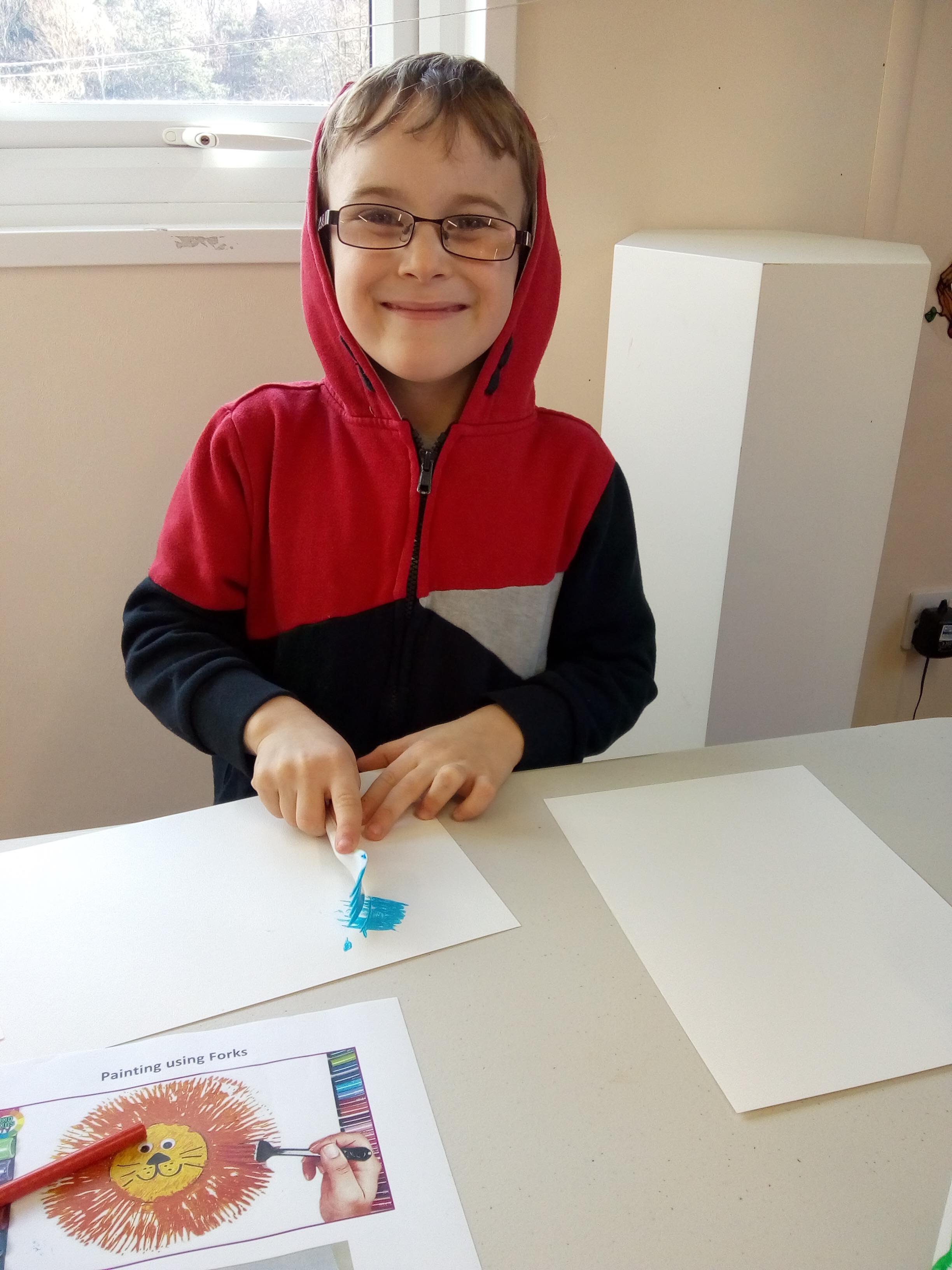 Boy painting and smiling72.jpg