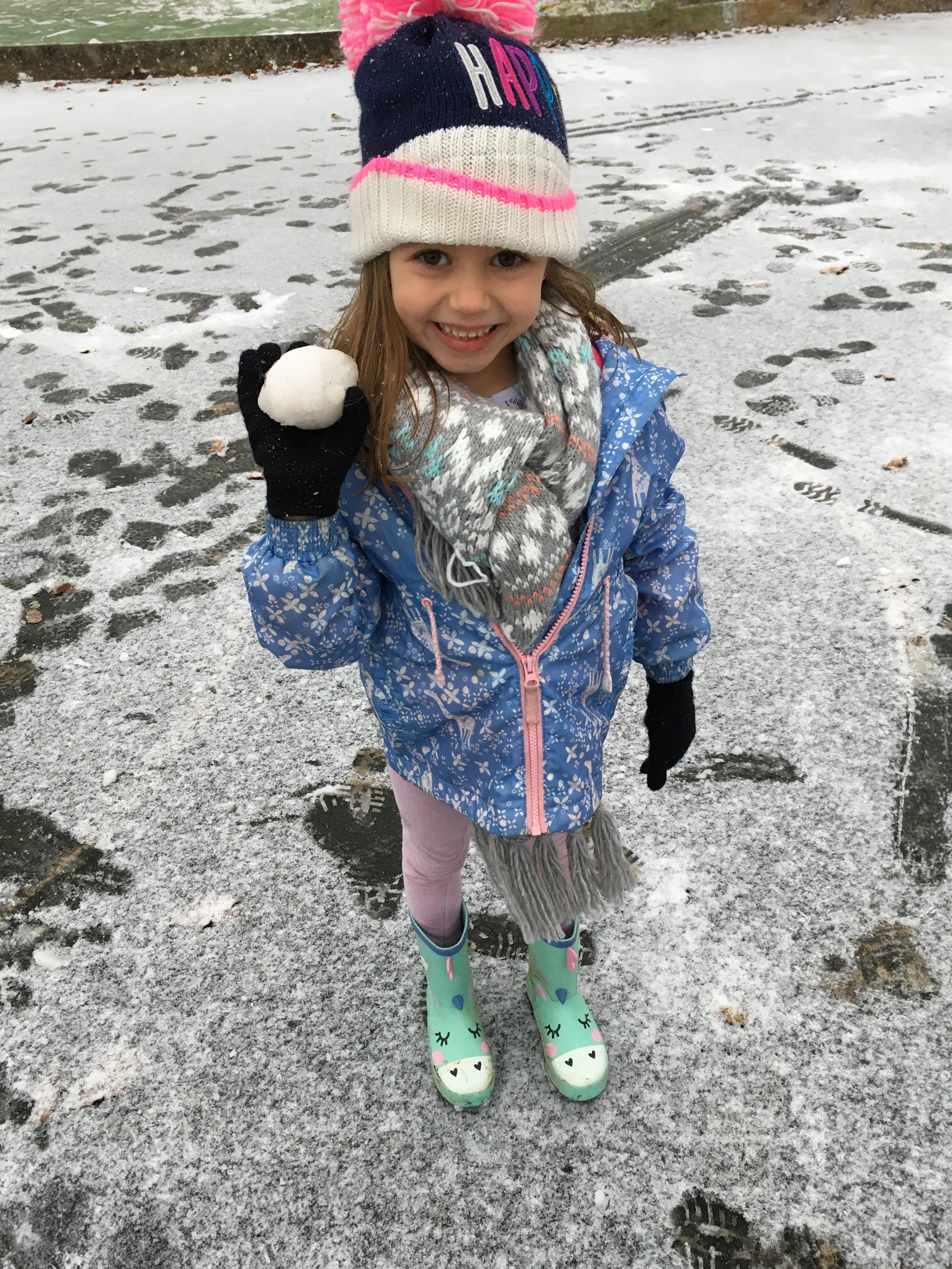 Child with snowball.jpg