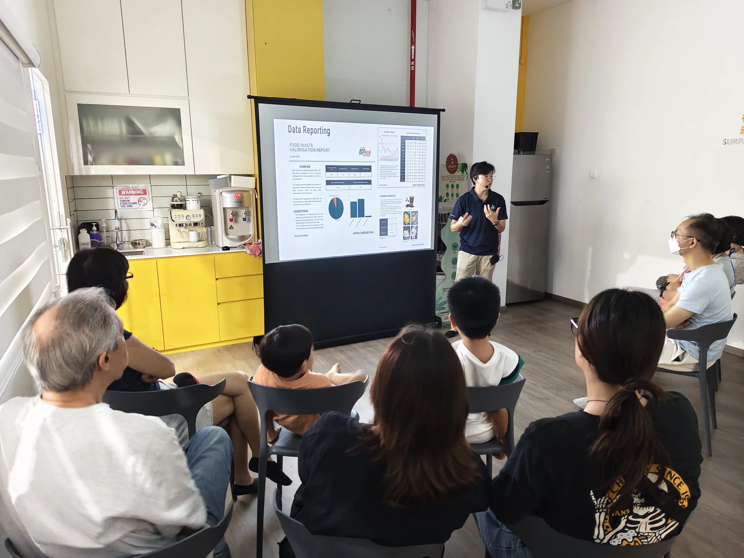 A group of visitors participating in Ento Industries' Site Tour, where they are listening to a seminar regarding food wastage and Ento Industries