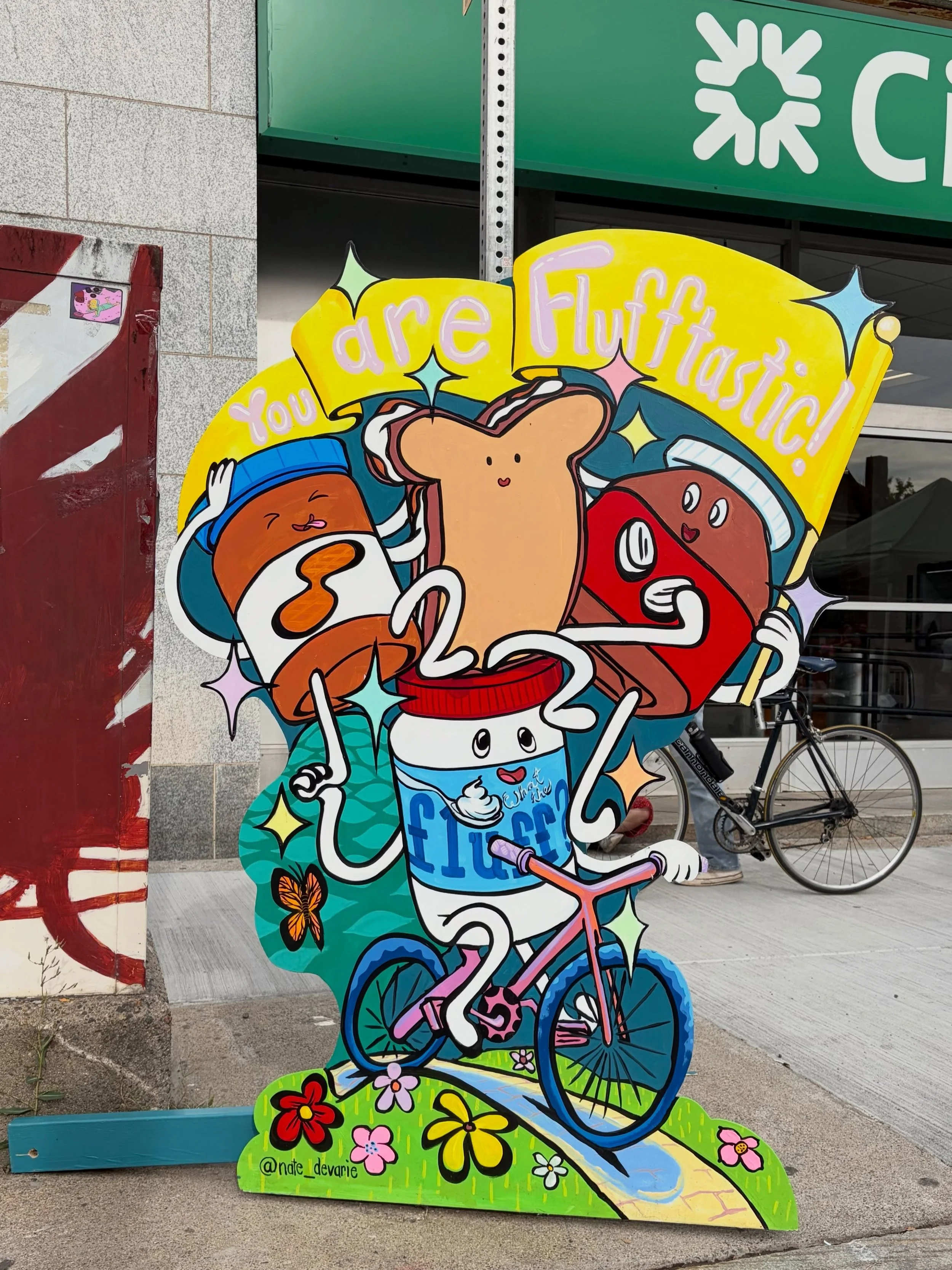 Swung through @flufffestival today and what a party! It felt like all of Somerville was there.  Did I eat a lot of Fluff? No. But I dug the vibe and this cutout by @nate_devarie caught my eye! @discoverusq 

#somerville #unionsquare #streetart #fluff