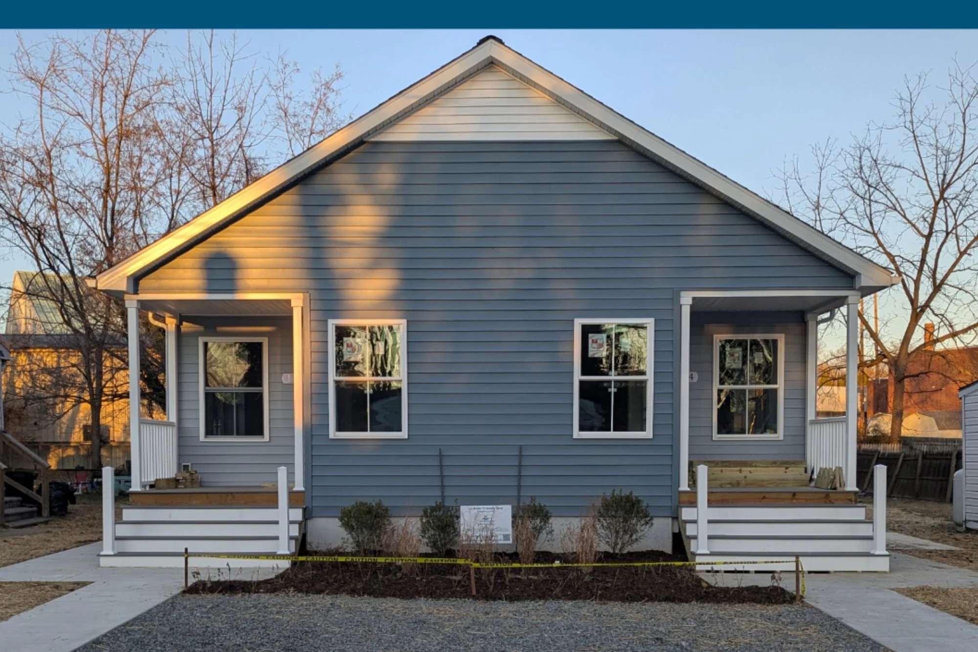 Kent Attainable Housing Holding Ribbon Cutting Ceremony for Prospect Street Duplex