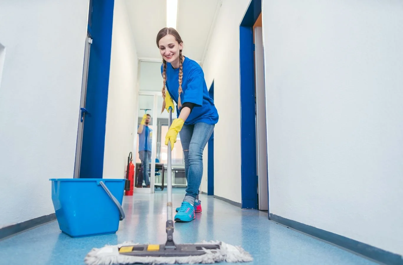 A Beyond Cleaning team member performing janitorial service in Oklahoma City, OK using professional equipment and delivering a spotless commercial space.