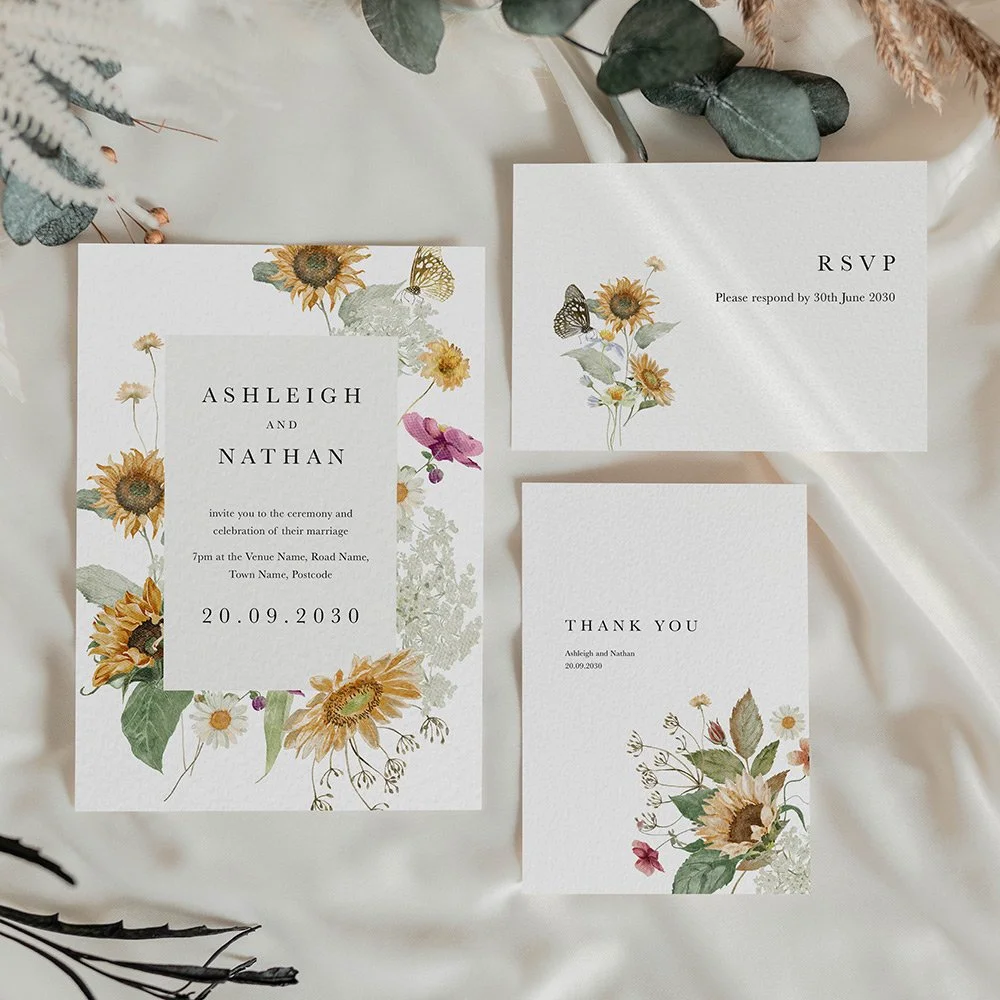 Autumn Sunflower Collection flat invitation set featuring vibrant yellow and orange sunflowers with sage green leaves, alongside matching RSVP and thank you cards.