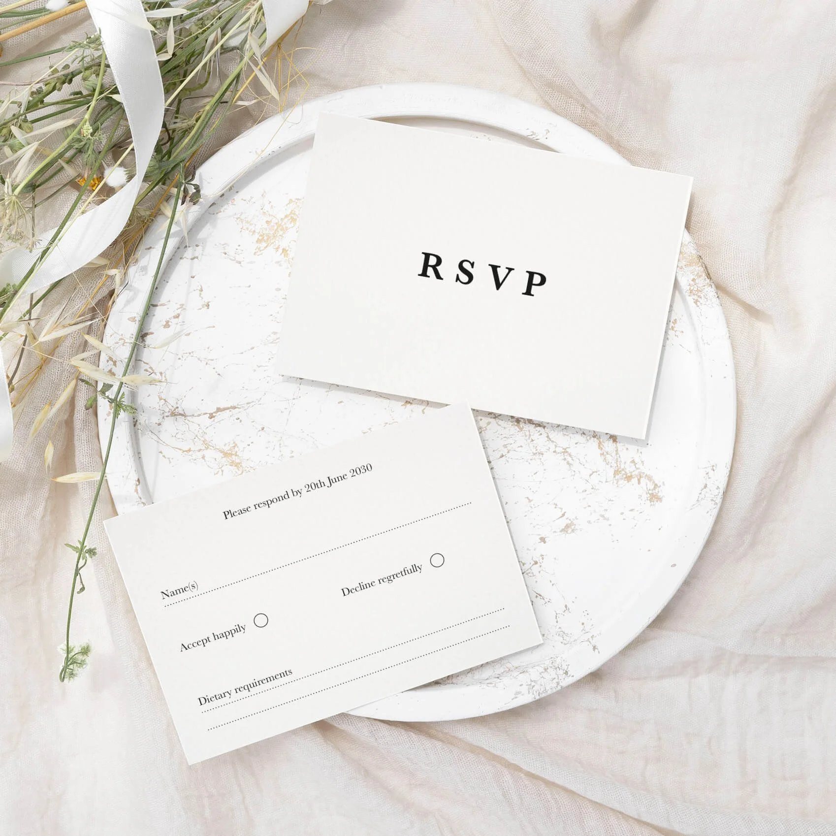 Minimalist wedding RSVP card with clean typography and modern layout on luxury off-white card