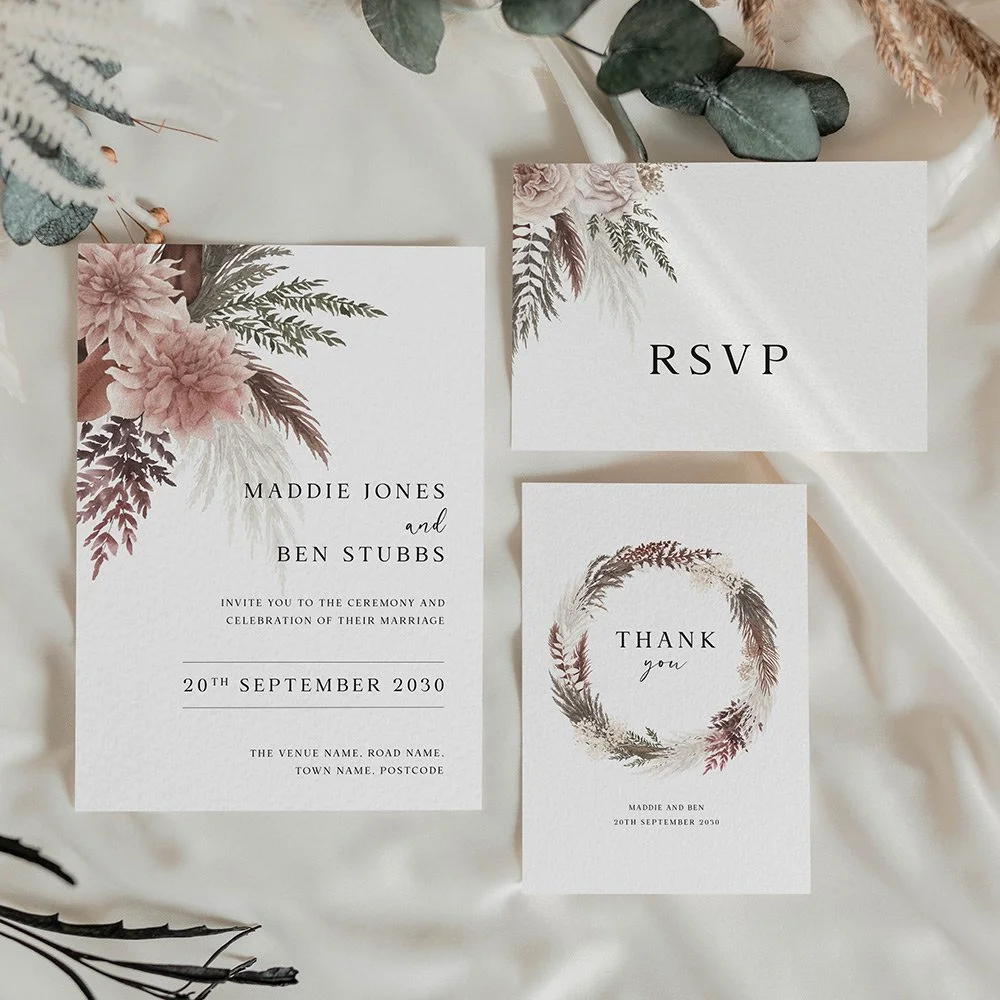 Blush Boho wedding invitation featuring a soft dusty pink floral border design, perfect for romantic and rustic wedding themes.