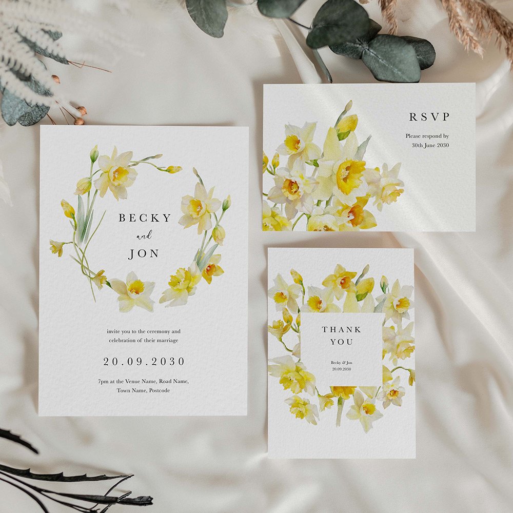 Wedding stationery suite consisting of invitation, RSVP card and thank you card featuring watercolour illustrations of yellow daffodils.
