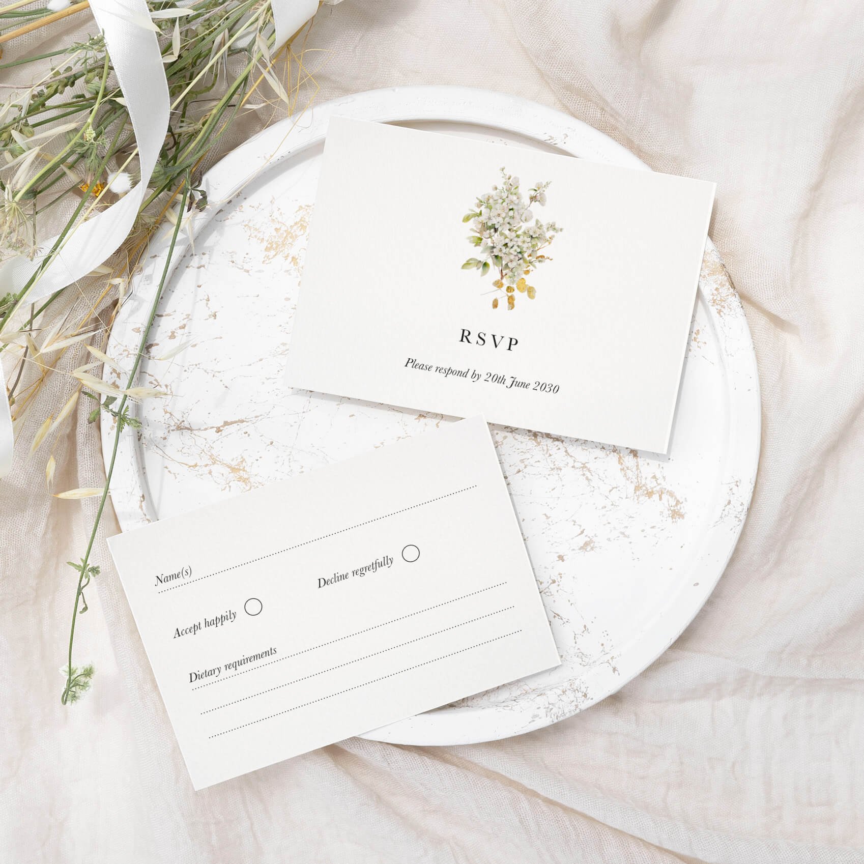 Ethereal wedding RSVP card with delicate botanical wildflower illustration and elegant typography on luxury off-white card